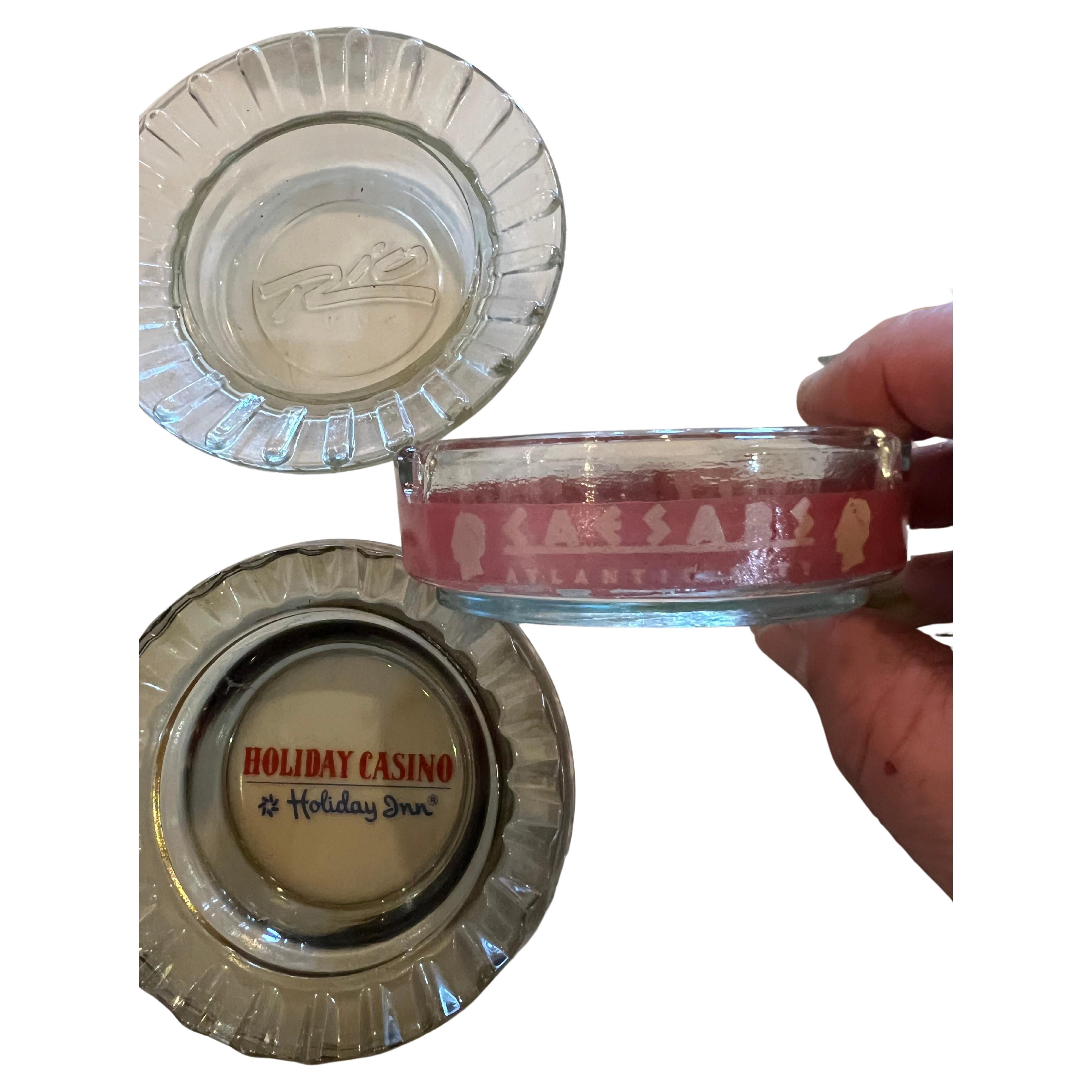 A very cool collection of eleven glass vintage Las Vegas casino ashtrays circa 1970s. All of the ashtrays are in very good vintage condition with no chips or cracks and clear, crisp graphics. On average, they measure 4