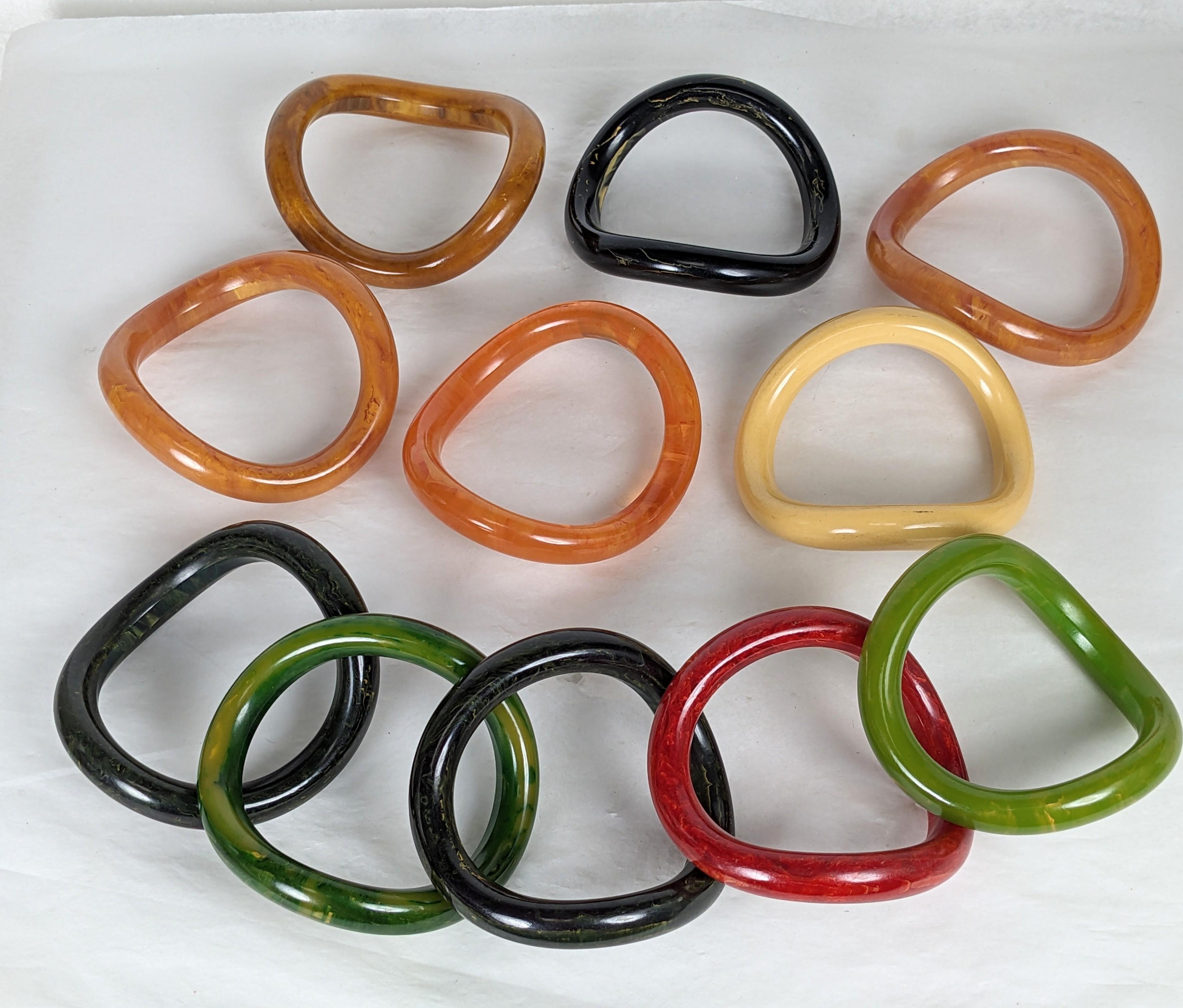 Women's or Men's Collection of End of Day Bakelite Squiggle Bracelets For Sale