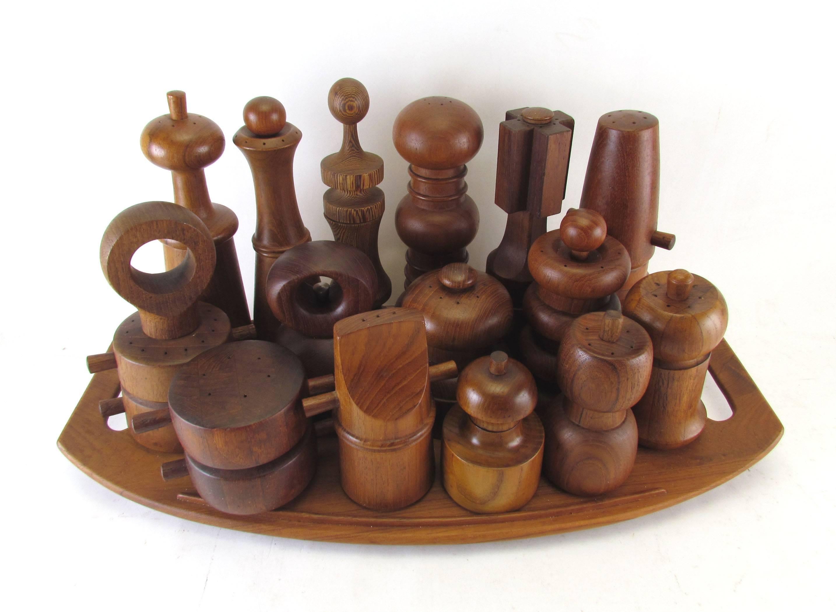 A collection of 15 Danish modern pepper mills, circa 1960s-1970s. The majority are teak and include mills by Jens Quistgaard for Dansk, Michael Lax for Copco, and Laurids of Lonborg, Denmark. These range in size from 4.25