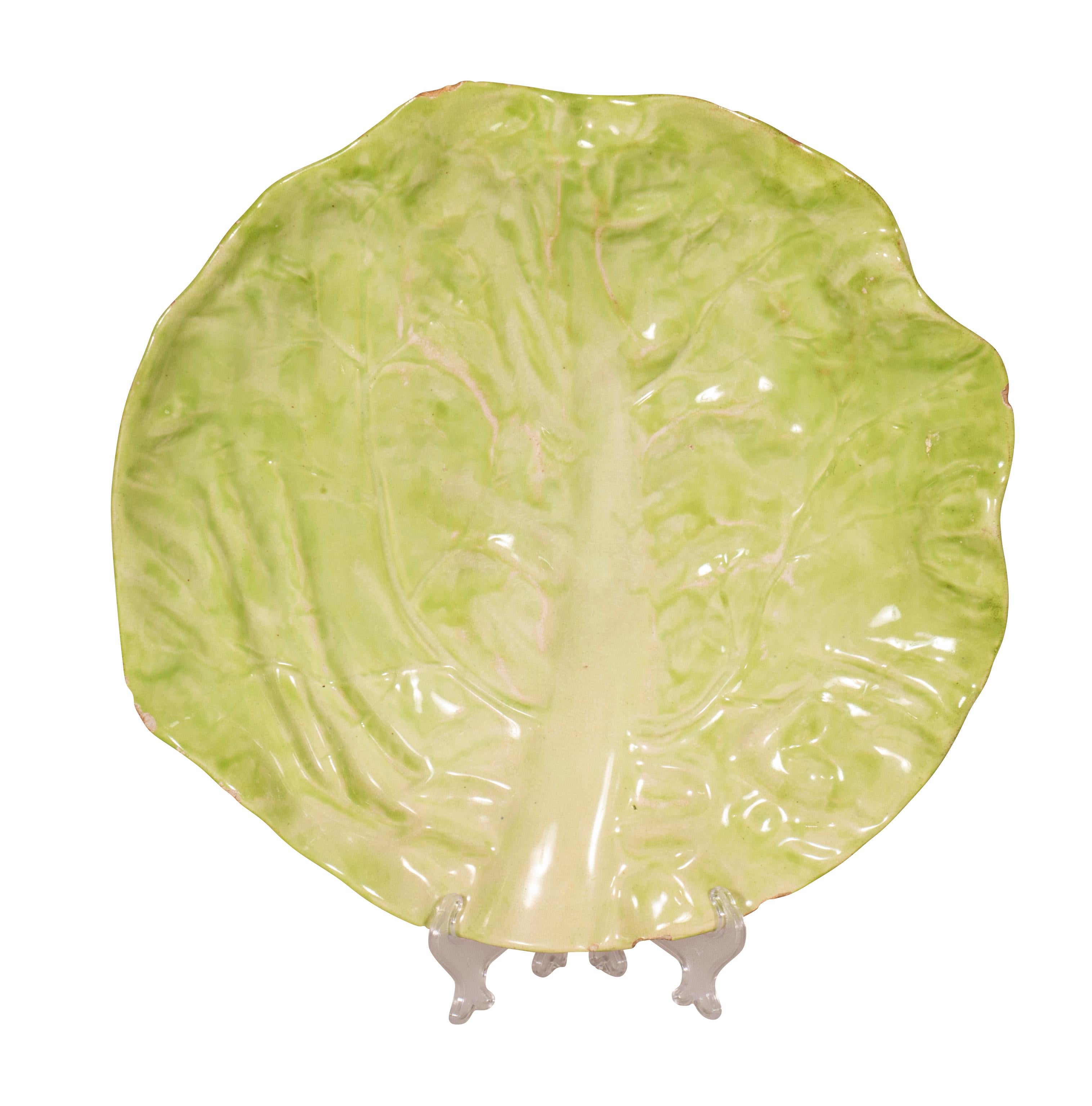 A total of 53 pieces of lettuce leaf in various sizes as follows:

20 luncheon plates, diameter 8 in.
11 salad plates, diameter 7.5 in.
1 charger, diameter 12 in.
2 dinner plates, diameter 10 in.
4 bread plates, diameter 6.5 in.
5 saucers,