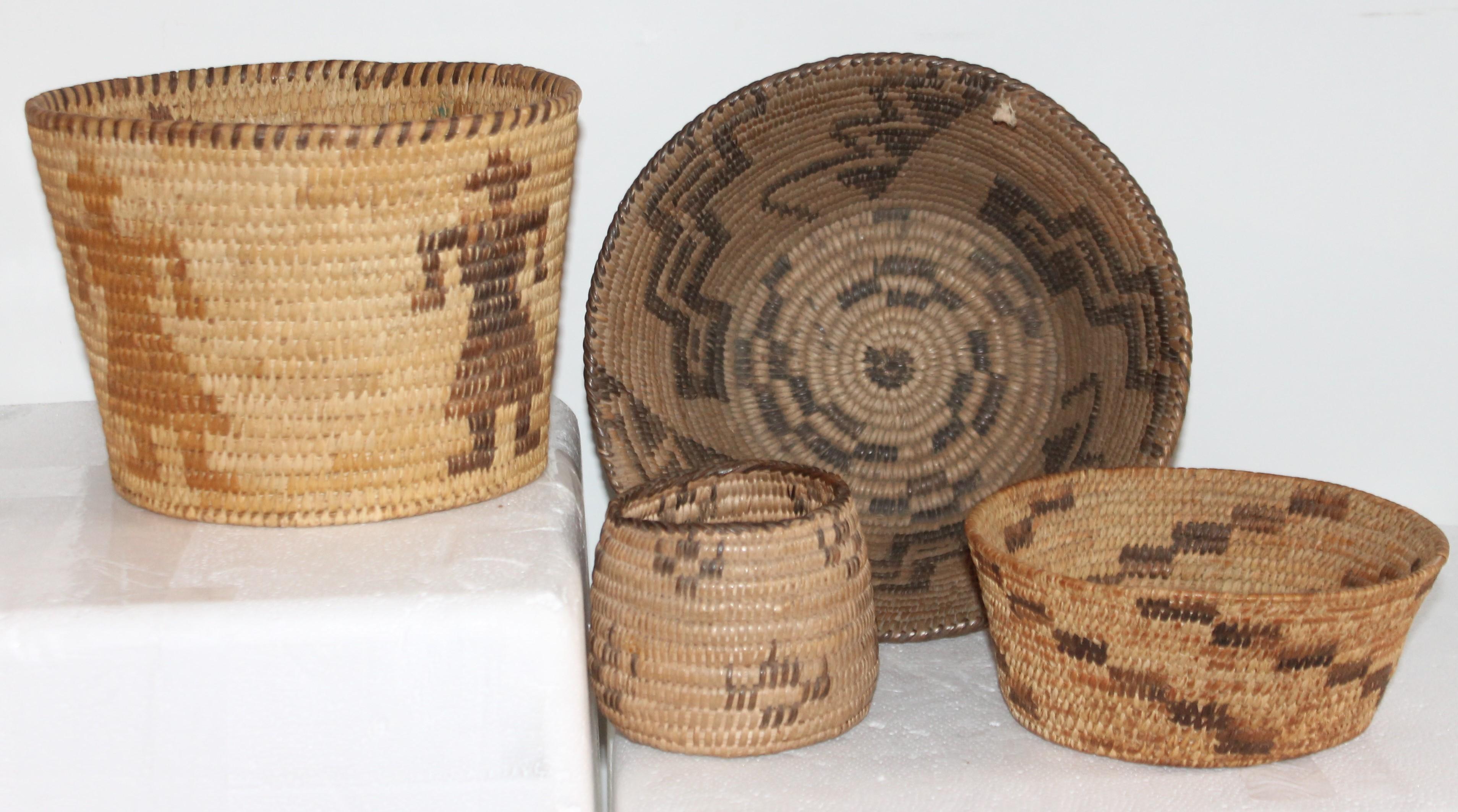 Baskets are measured from left to right, sold as a group of five baskets. Pima and Papago native American basket assortment.
Pictorial basket - 8 x 6
Large handmade basket - 11 x 4.5
Medium sized basket - 9 x 5.5
Miniature basket - 3.5 x