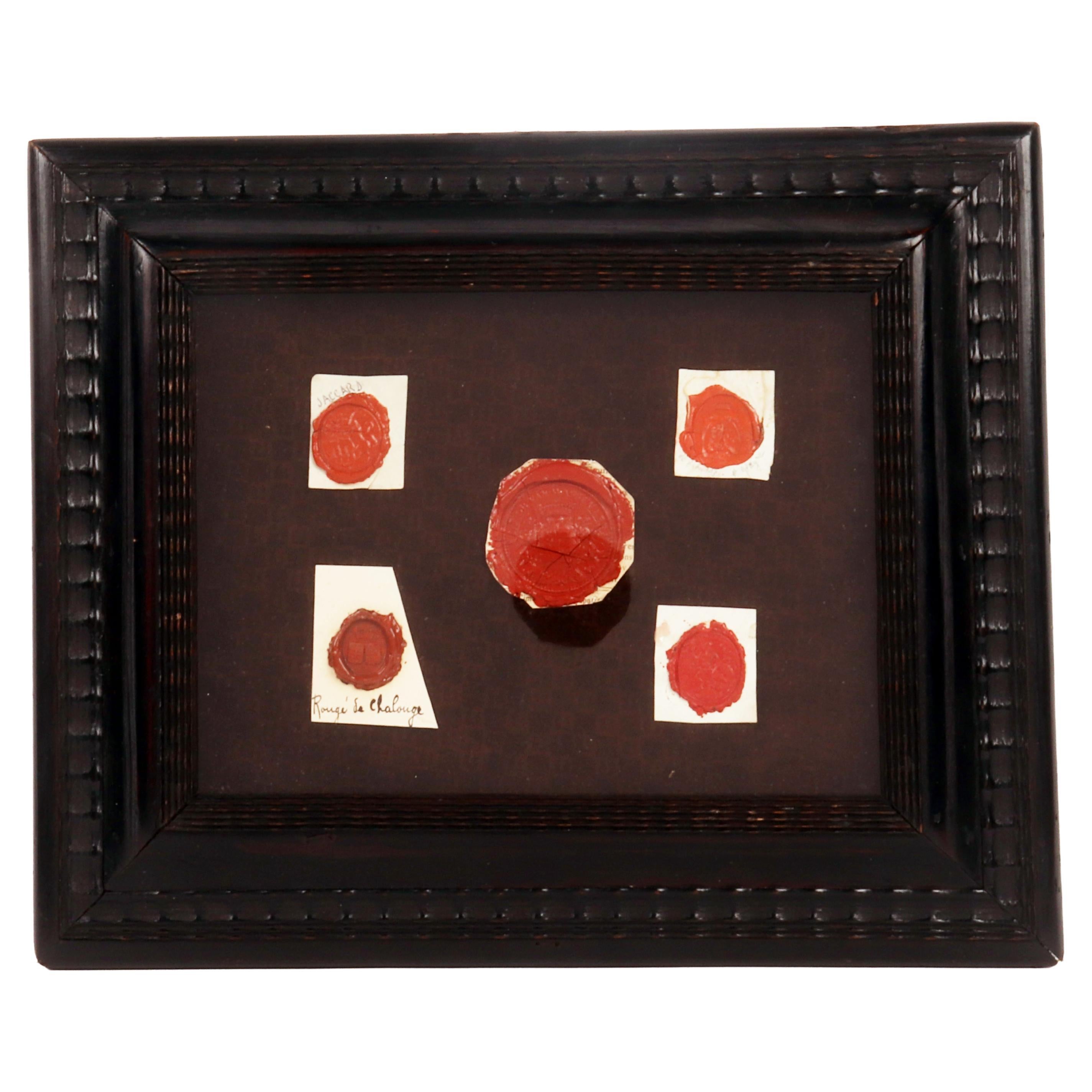 Collection of five framed wax impressions from seals, France 1850.  