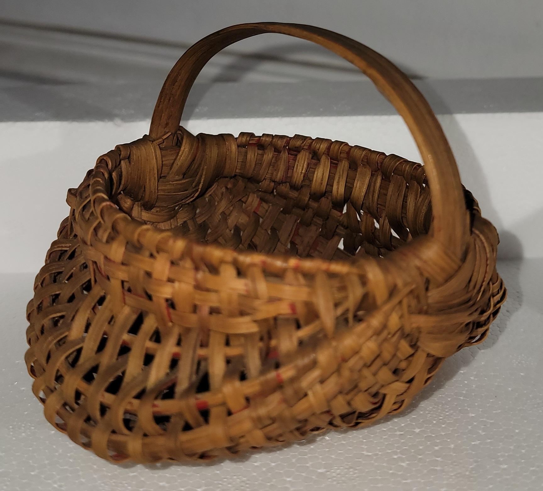 This collection of five 19thc early hiney baskets are in pristine condition.The tiny basket is only two x two in size. The others are 4 wide x 4 high and are in very good condition !This collection came from a private New England folk art