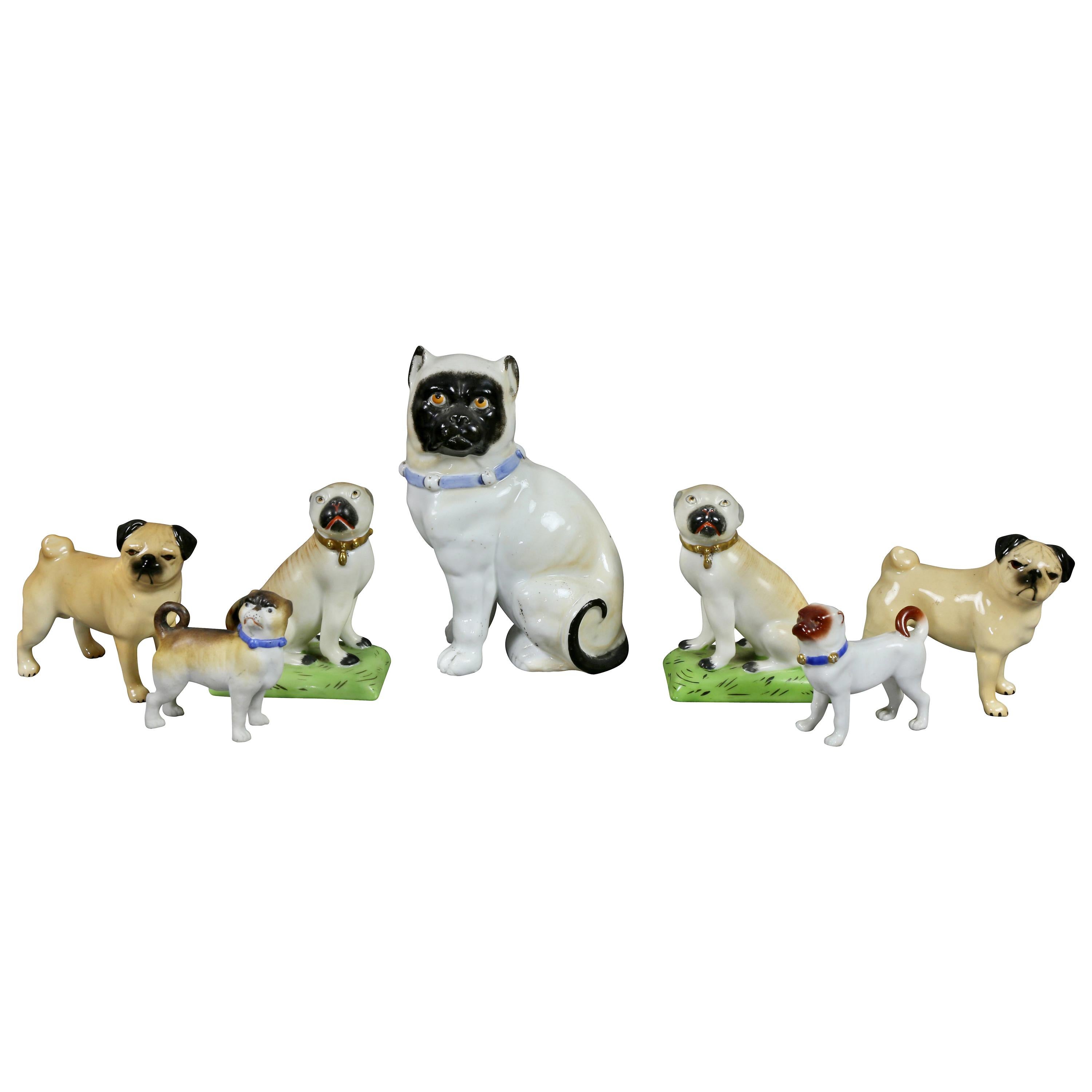 The Collective of Forty Two-Pottery and Porcelain Pug Dogs (collection de quarante chiens carlins en poterie et en porcelaine)