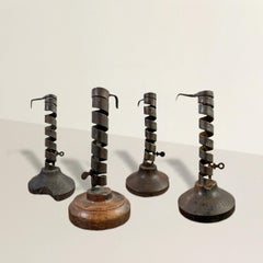 Collection de quatre chandeliers de mineur français du XVIIIe siècle