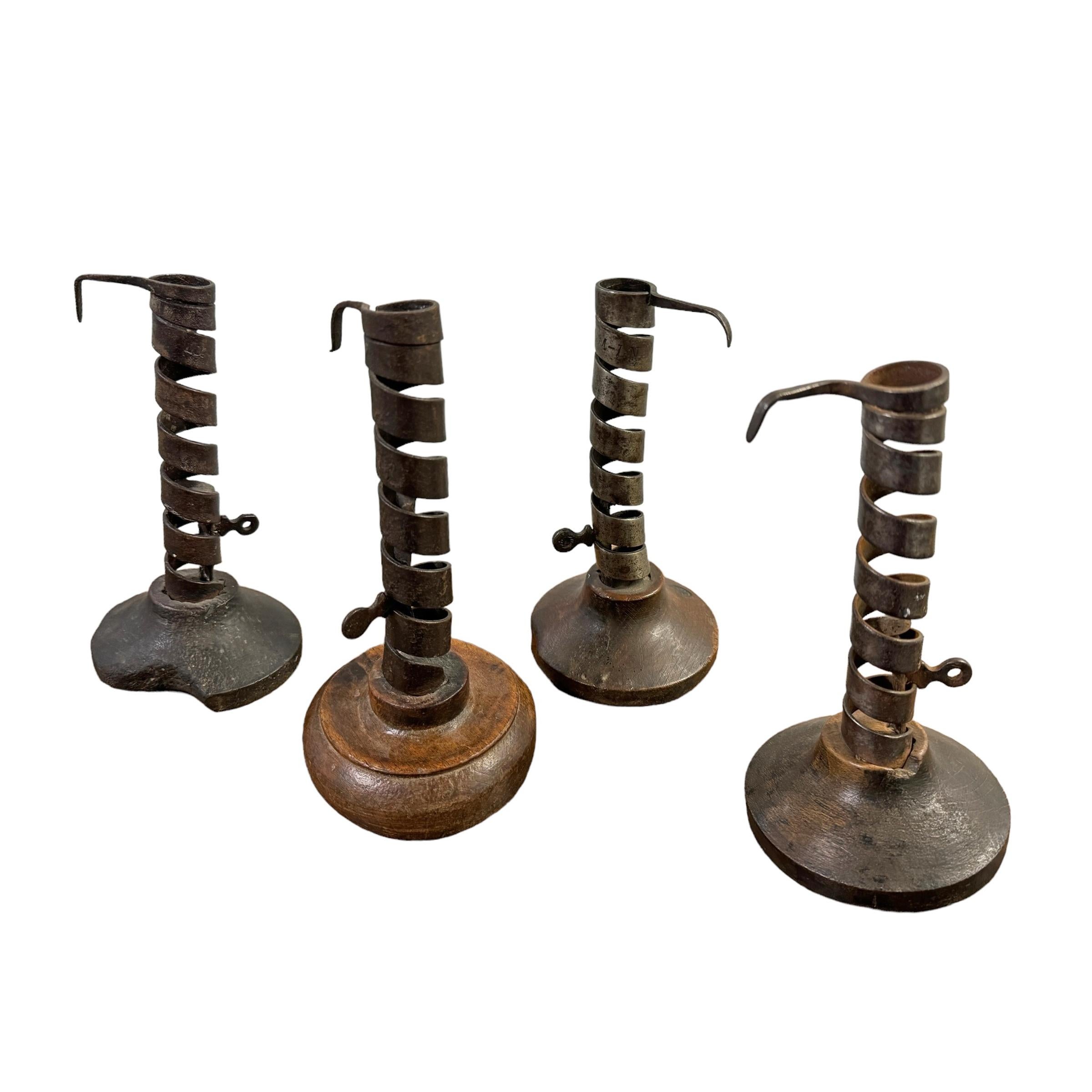 Primitive Collection of Four 18th-Century French Miner's Candlesticks