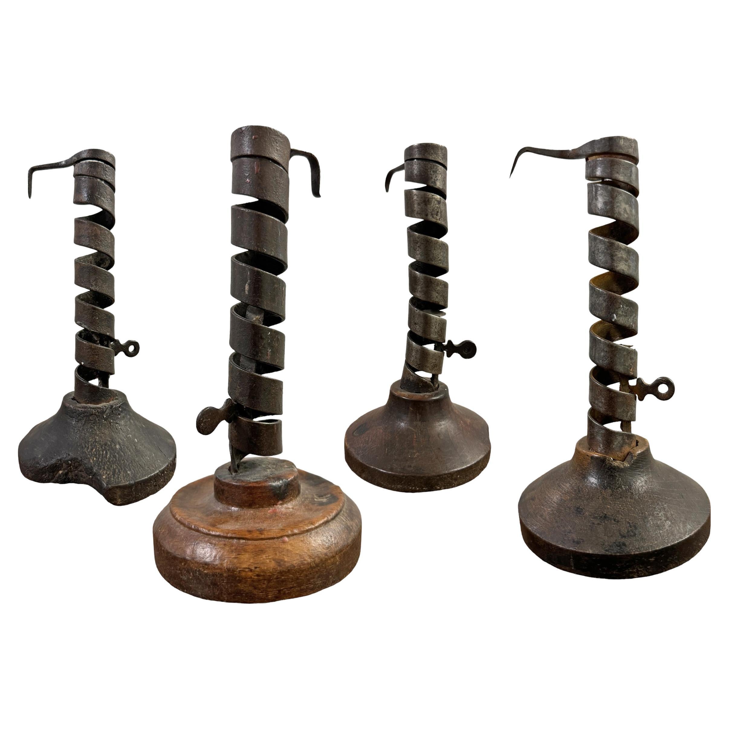 Collection of Four 18th-Century French Miner's Candlesticks