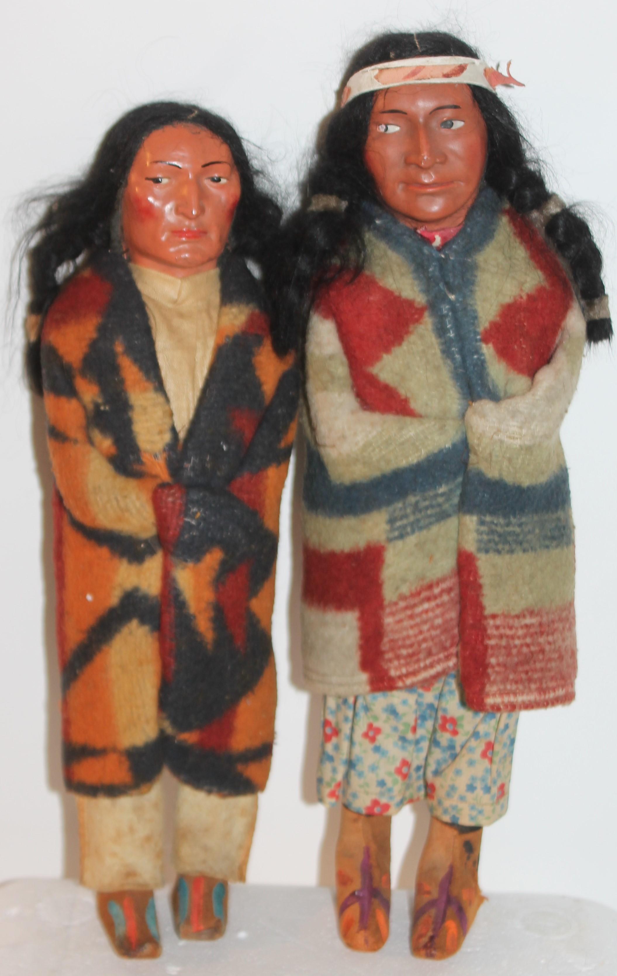 Collection of Four 1930's Skookum Native American dolls. The Dolls have real hair and are wearing Indian design Beacon blankets. Skookum dolls are highly collectible.
largest measures - 13 tall x 3.75 wide 
smallest measures - 11 tall x 3.5 wide.