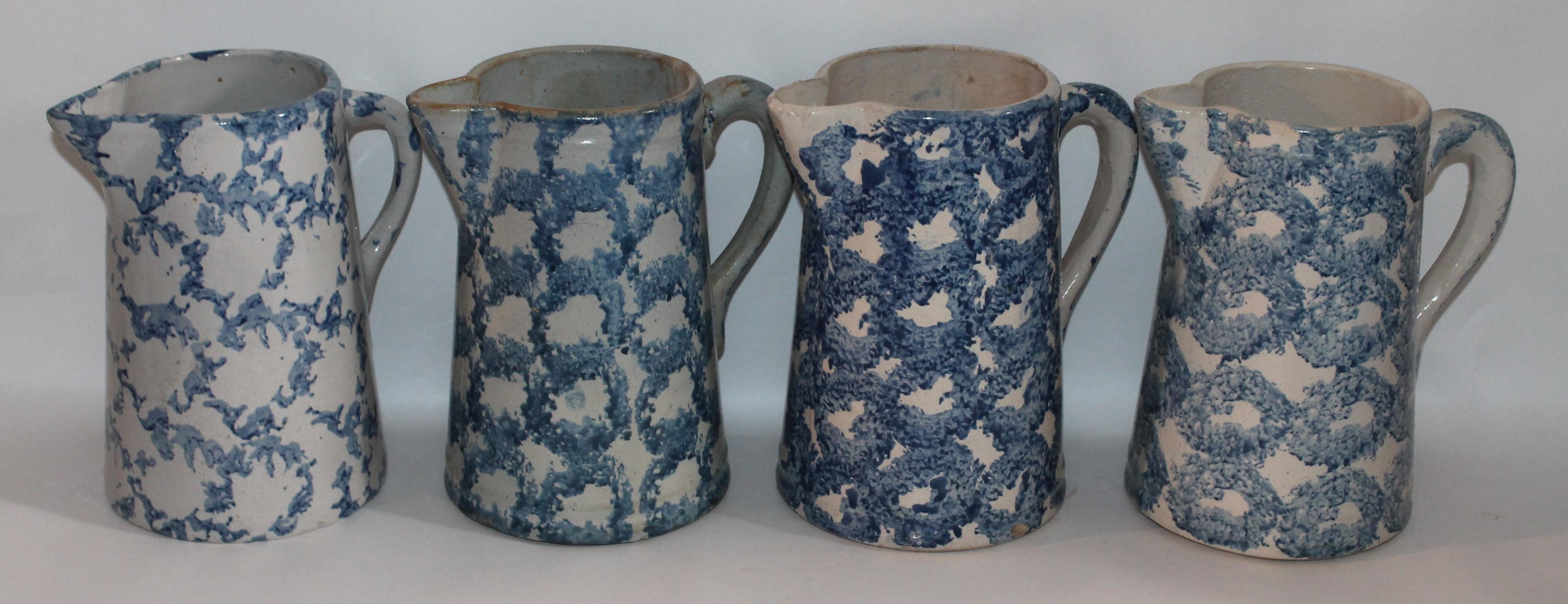 Design pattern sponge ware pitchers in great antique condition. The blue and white patter is in a smoke design patter. Great age.

All sponge pitchers measure the same. Individually 695.00 each.