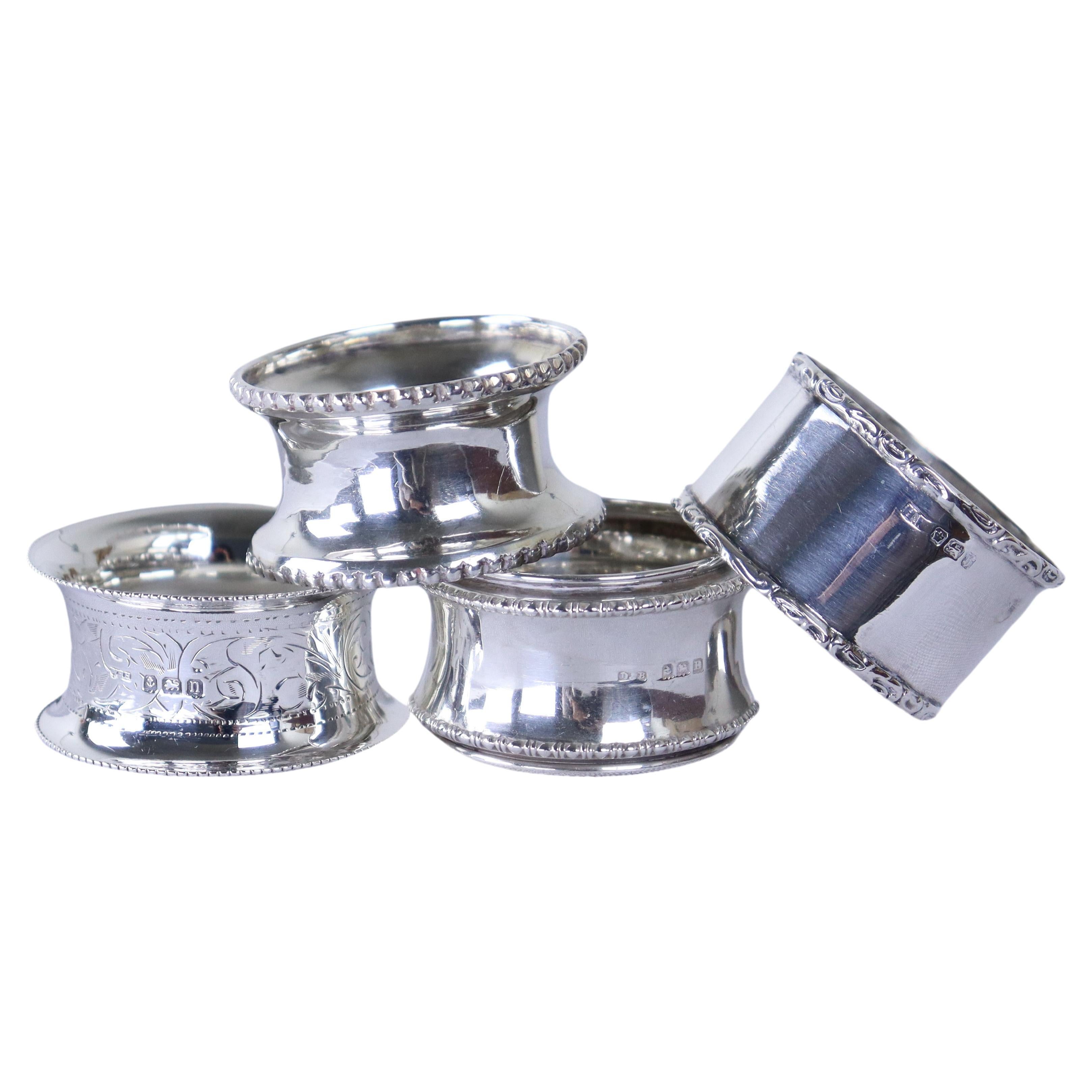 Collection of Four Assorted English Hallmarked Silver Napkin Rings, Birmingham  For Sale