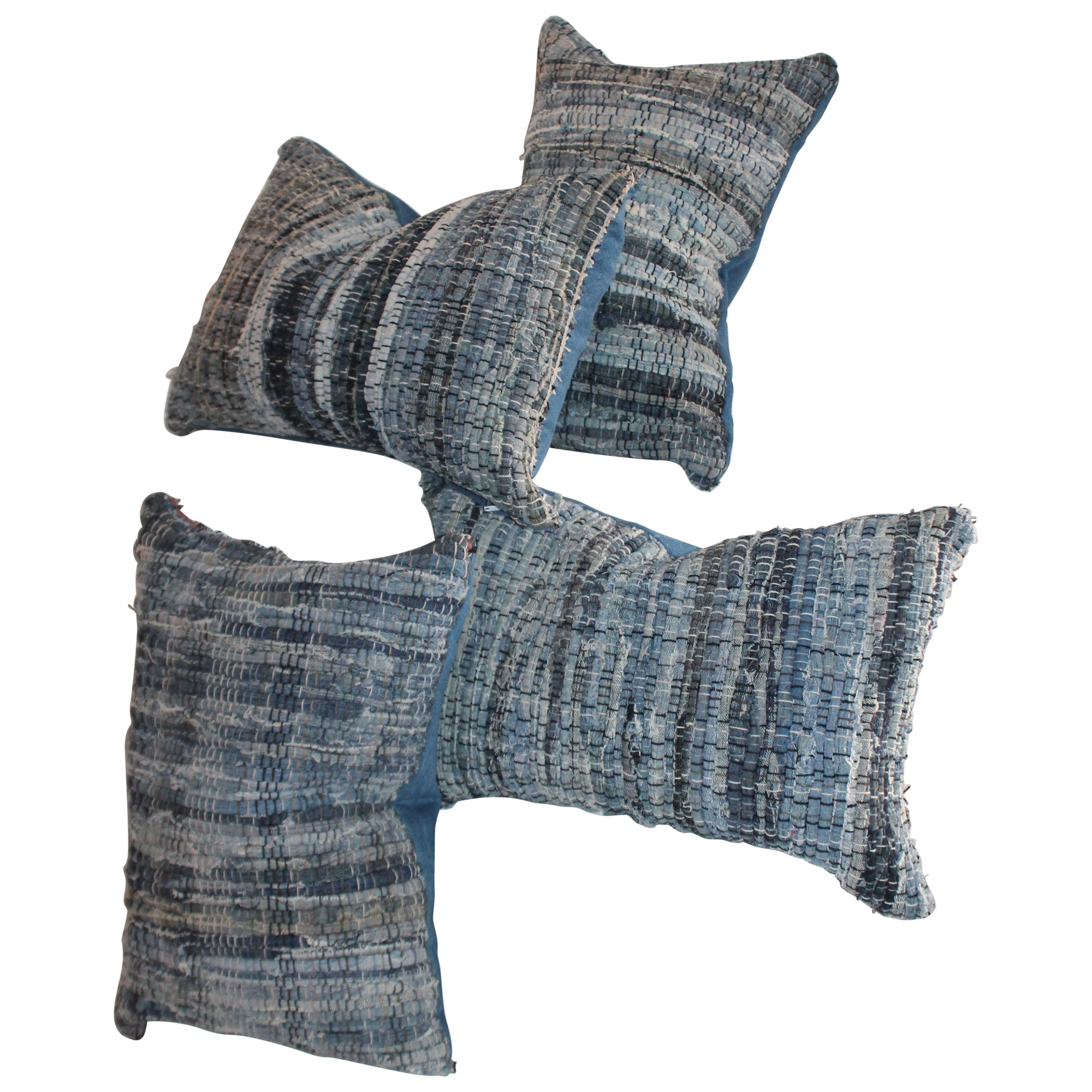 Collection of Four Blue Rag Rug Pillows