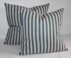 Collection of Four Blue Striped Ticking Pillows