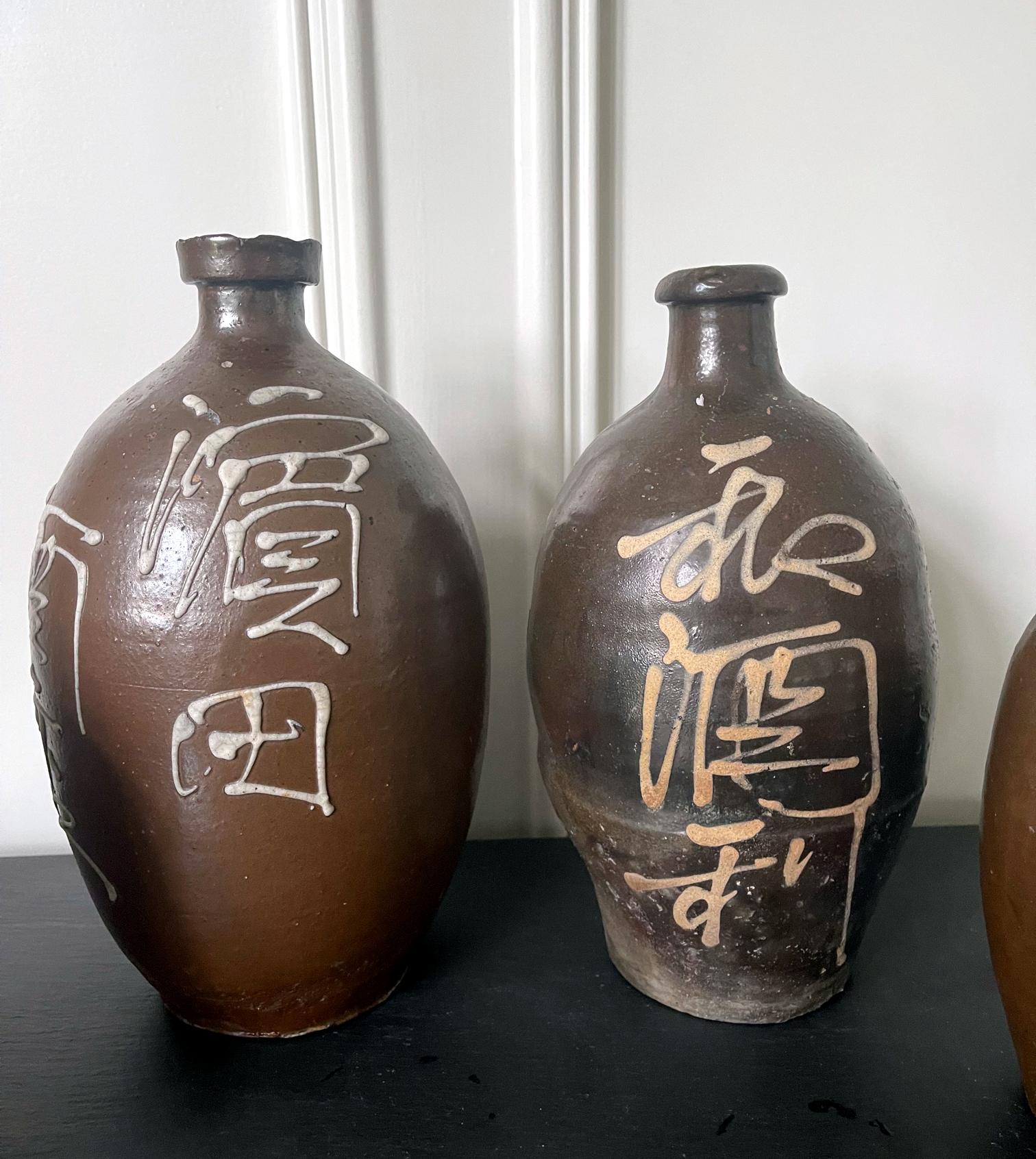 Japonisme Collection of Four Japanese Tamba Tokkuri Sake Bottles  For Sale