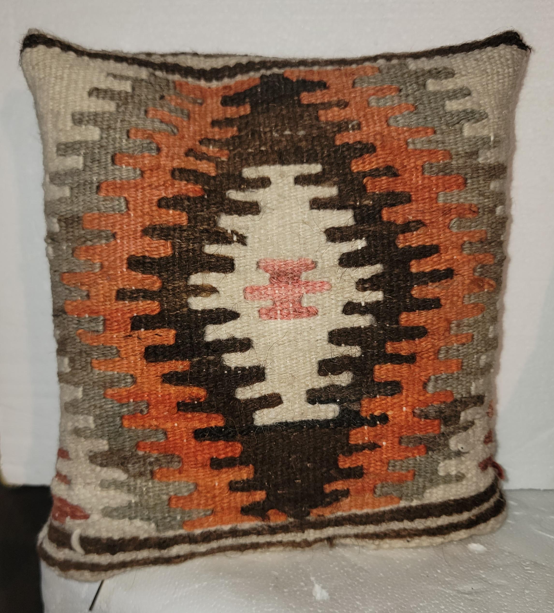 This collection of mini Navajo weaving children's or sampler weaving pillows.The further most right pillow is a double sided pillow. The back of that plllow is shown as the last image with beige wool and brown stripe.
Sold as a collection.
Pillows
