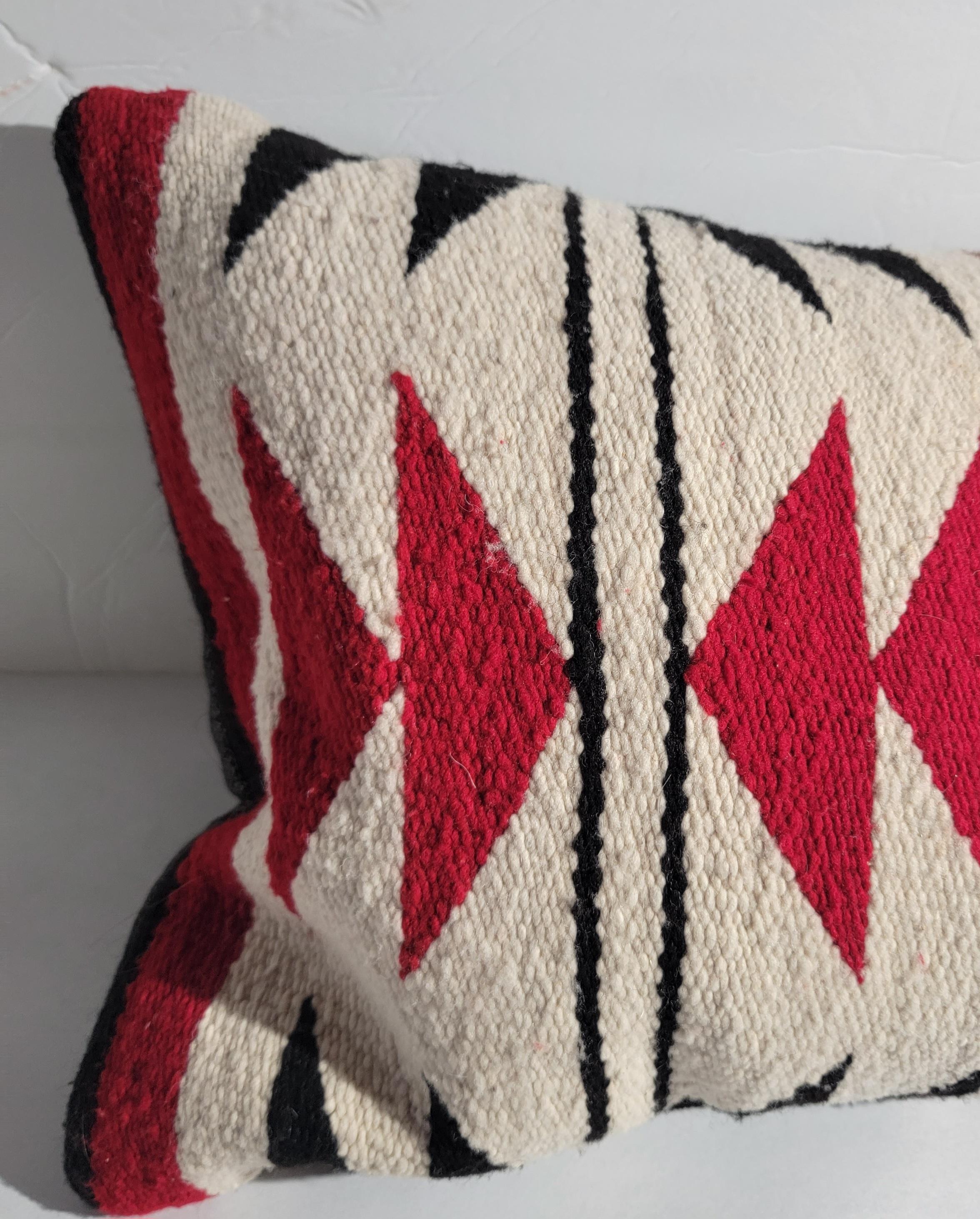 Set of four Navajo weaving pillows This set of four is chosen at random. The set is chosen by the reds and browns. All in very good condition and have linen backings.The inserts are down & feather fill.
Sold as a collection of four assorted weaving