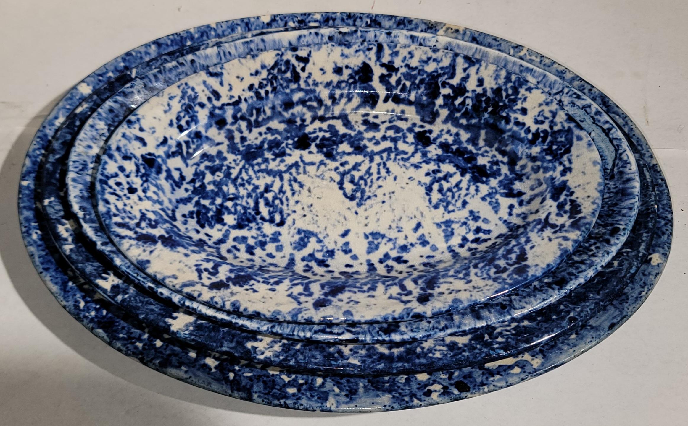 Hand-Crafted Collection of Four Oval Sponge Ware  Platters For Sale