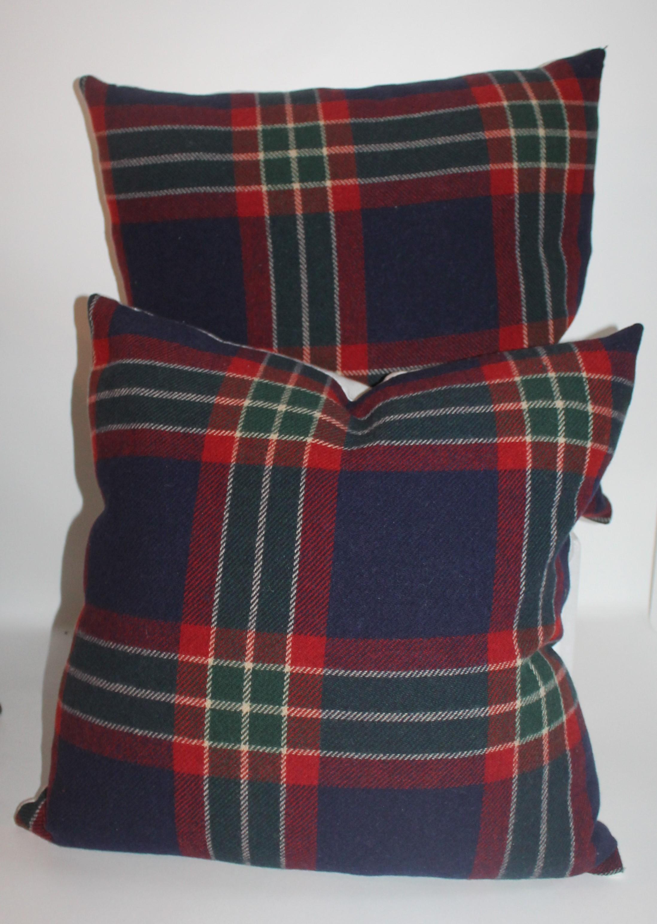 These plaid vintage wool blanket pillows are in fine condition. We are offering the collection of two pairs of pillows in two different sizes for a great look on a sofa or bed. The backings are in blue cotton linen.

Measures: 20 x 20 smaller