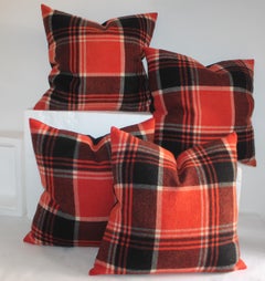 Collection of Four Plaid Blanket Pillows