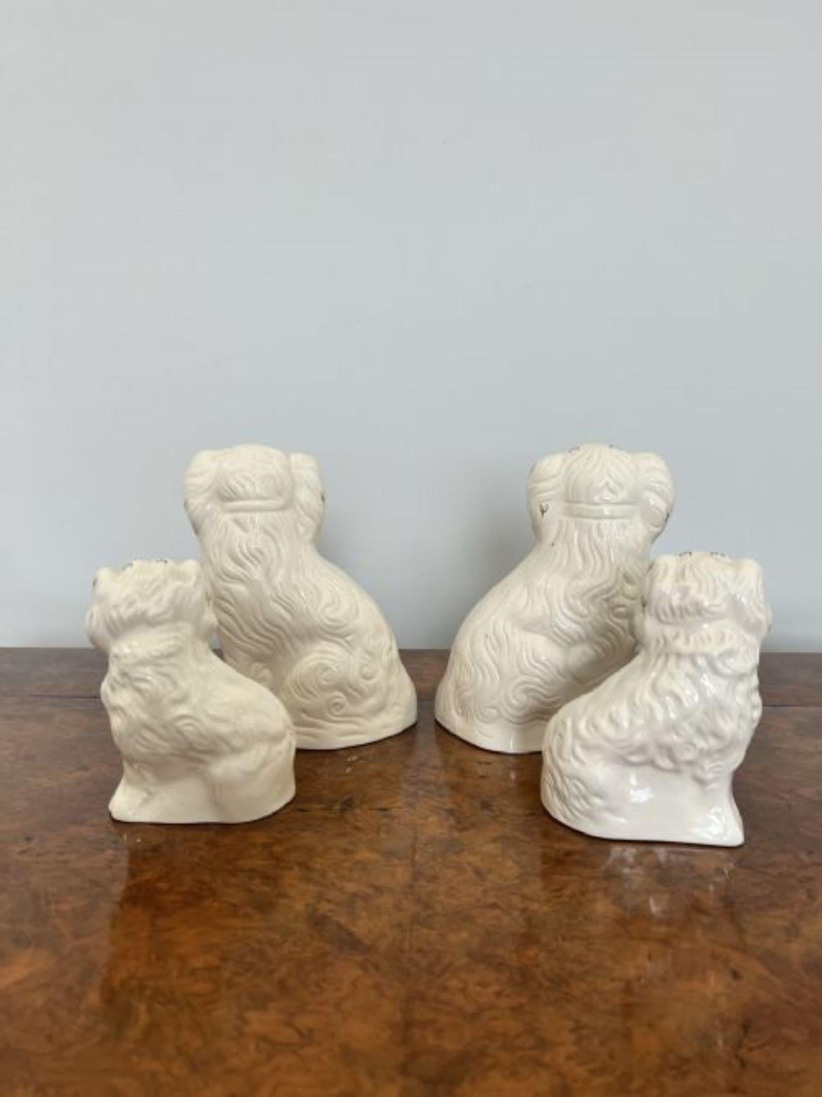 Ceramic Collection of four quality Royal Dolton seated spaniels  For Sale