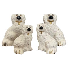 Vintage Collection of four quality Royal Dolton seated spaniels