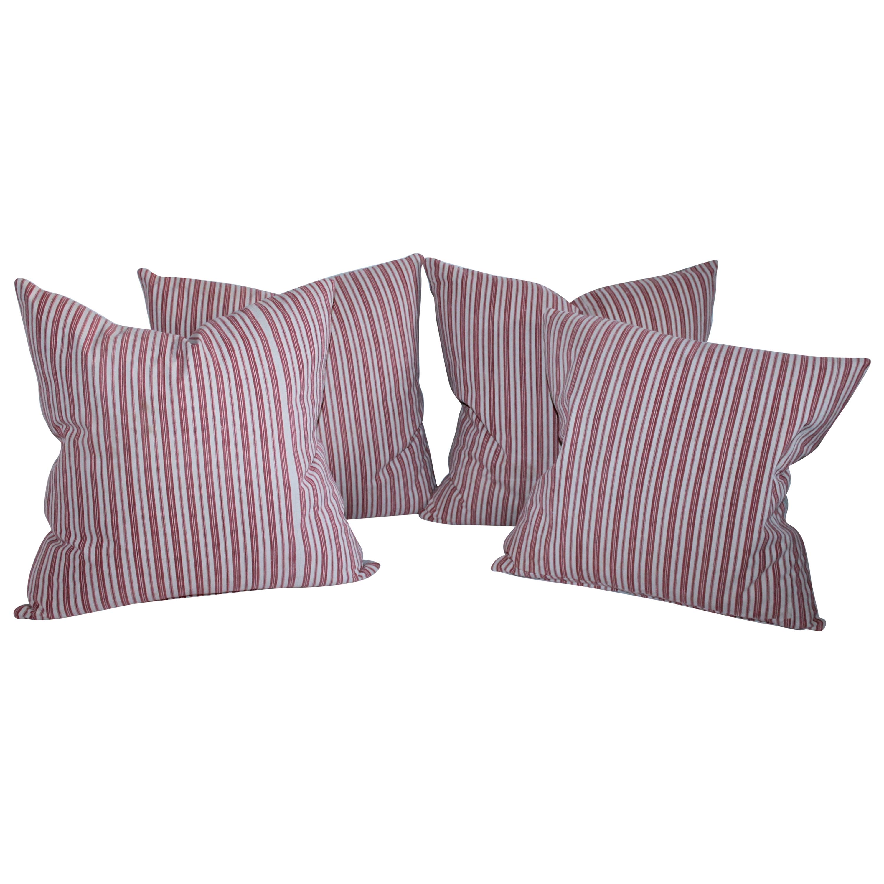 Collection of Four Red and White Vintage Ticking Pillows For Sale