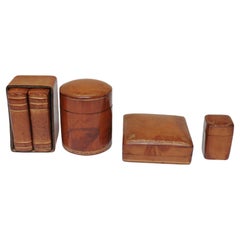 Colección de cuatro cajas vintage florentinas de cuero repujado Scuola del Cuoio