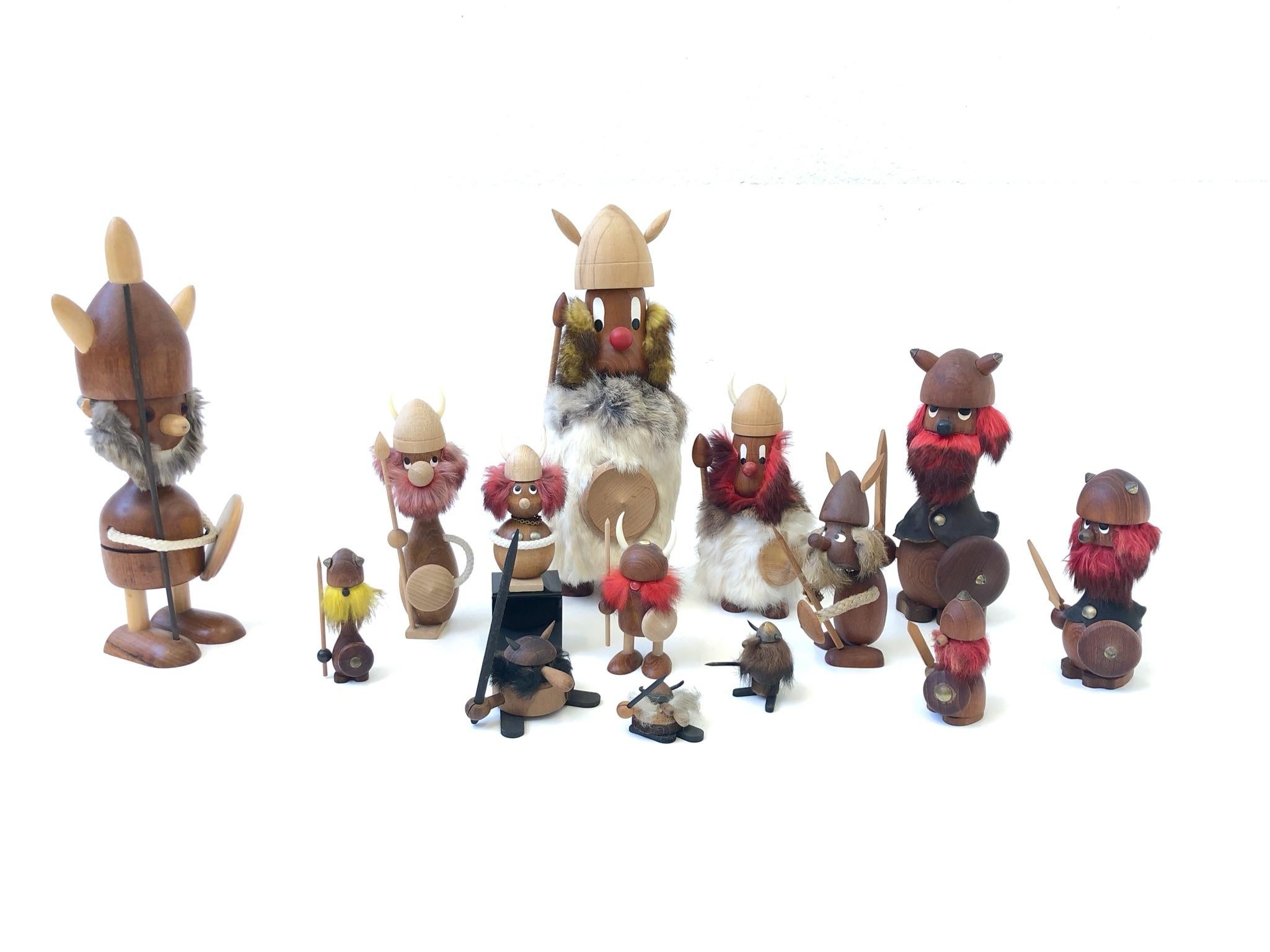 A cool collection of fourteen Danish Viking toys by Hans Bolling and Kay. The Vikings are made out of mix woods and real fur. They are from the 1950s-1970s. Dimensions very the tallest one 13” high and the smallest one is 2” high.