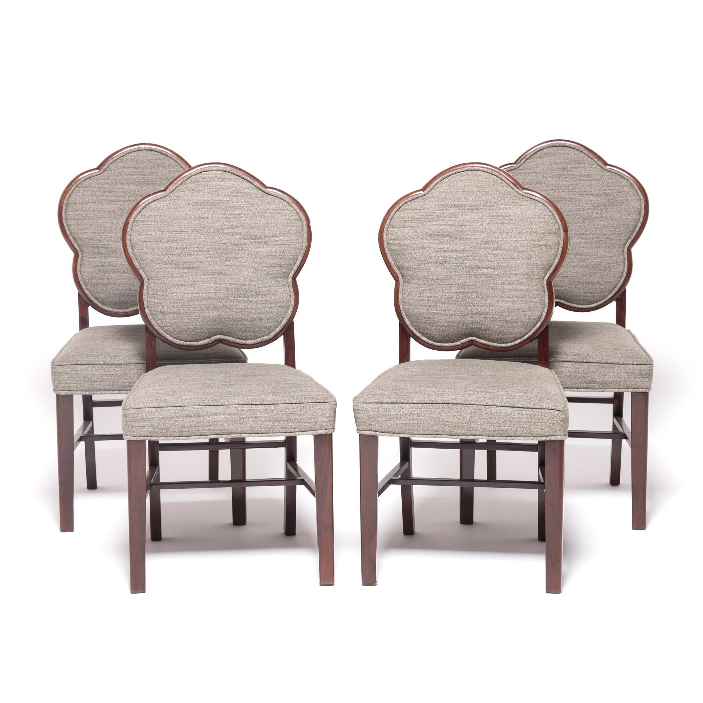 Made in the 1920s to satisfy the worldwide hunger for all things Art Deco, this collection of rosewood chairs from Shanghai combine the streamlined style of the era with hints of a Chinese aesthetic. The beautiful rosewood frames uphold tradition