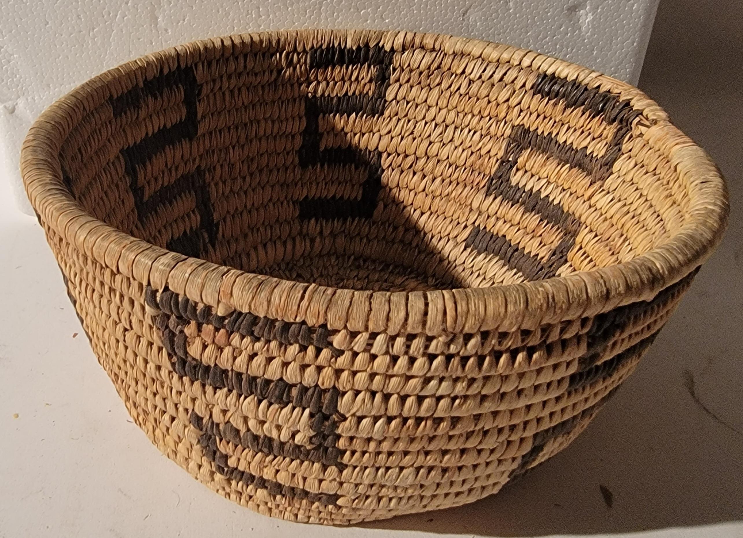 This collection of Pima baskets are all from a private Indian collection. 
All in fine condition. Sold as a group of four baskets.

Largest basket - 6x11

Medium basket -6x10
small basket -5x8
Basket with handle - 5x8.