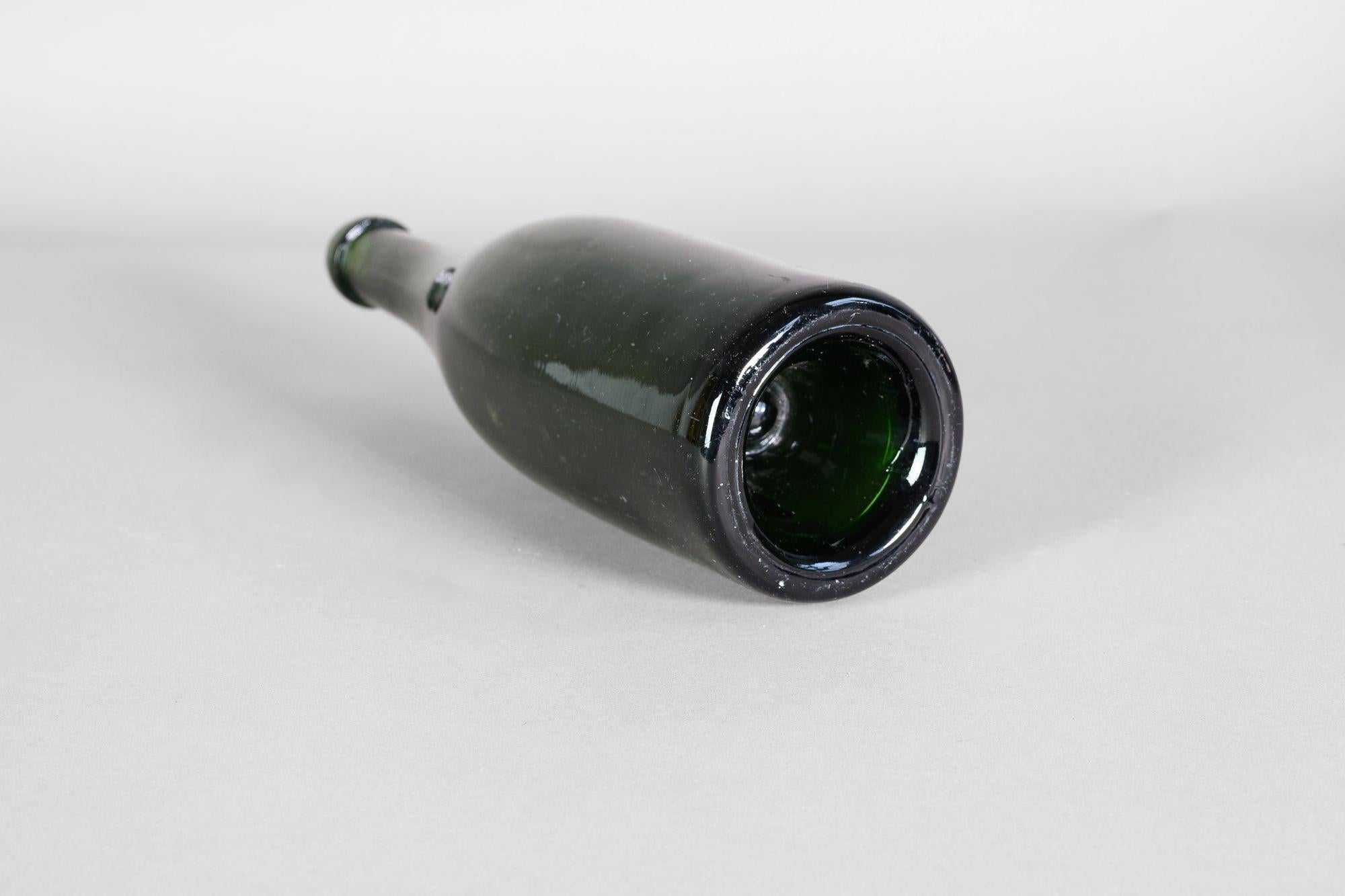 Colección de botellas de vino de cristal (7) principios del siglo XX en venta