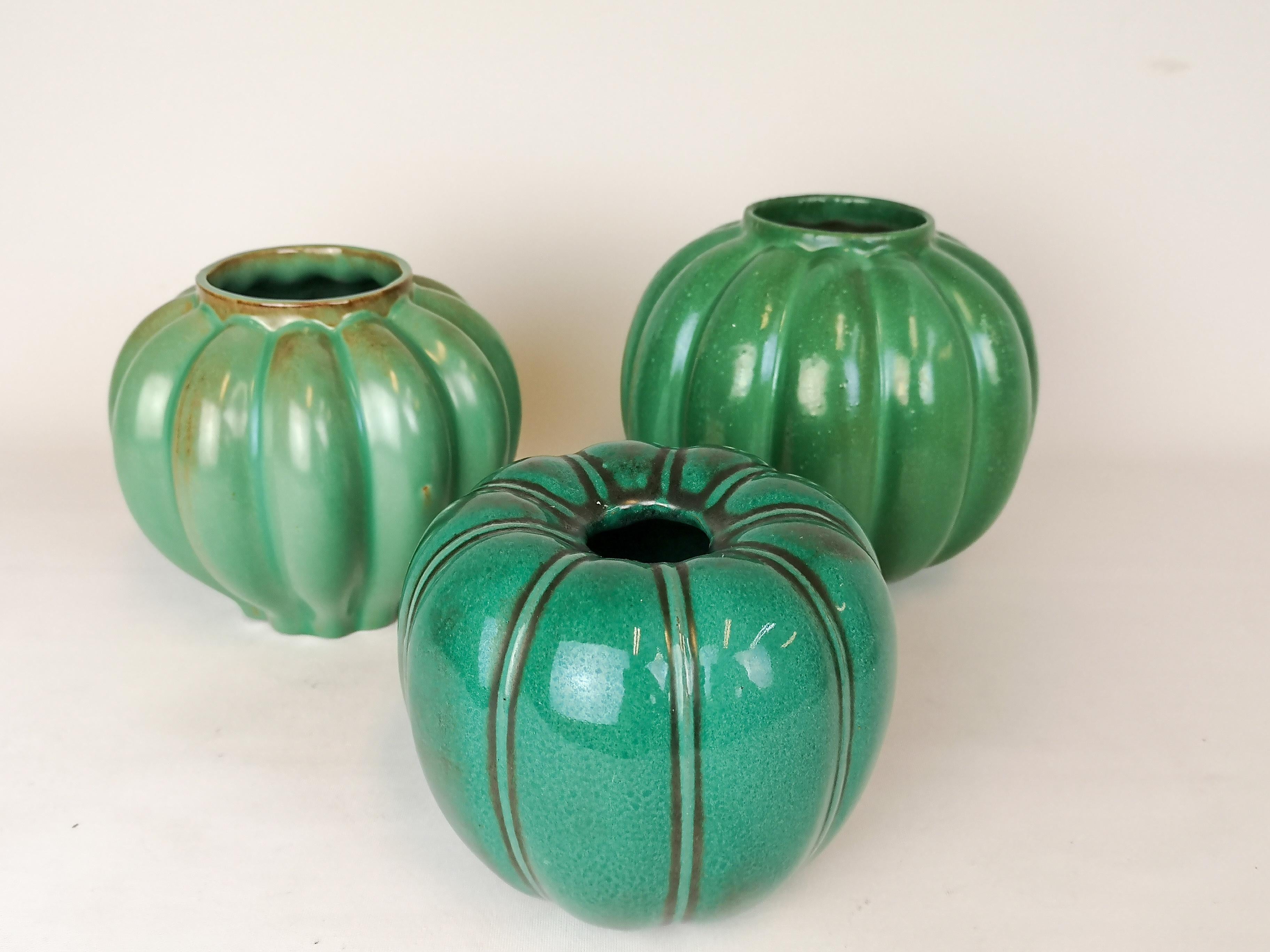 This collection of totally 13 pieces green Art Deco vases was manufactured in Sweden during the 1930s-1940s. There are 10 pieces of Ekeby, 2 pieces Bofajans Ewald Dahlskog and one piece from Höganäs.

The shapes and form combines perfect with the
