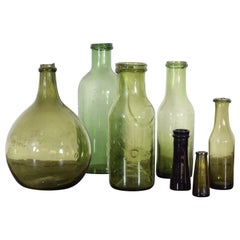 Collection of Green Blown Glass Bottles, Early 20th Century
