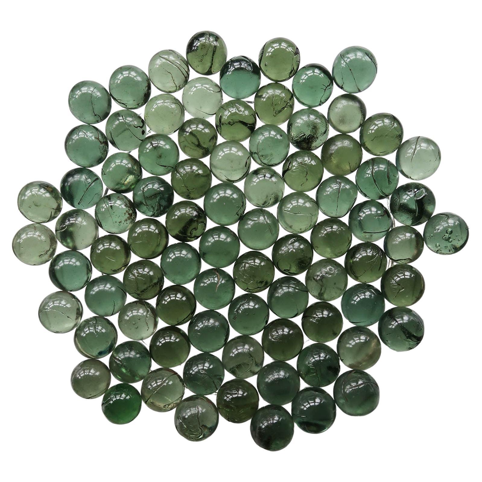 Collection of Green Glass Marbles. English, 19th Century For Sale