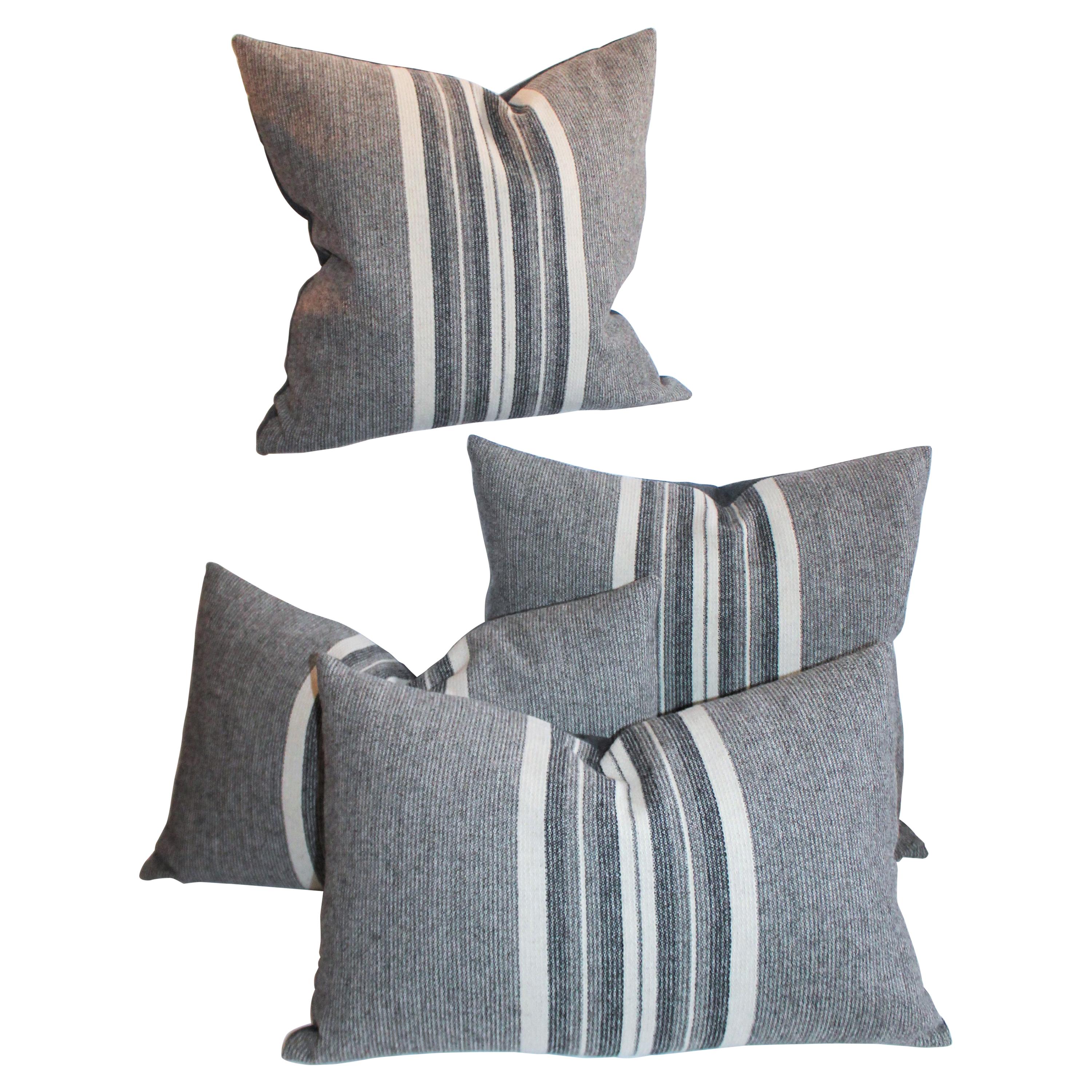 Collection of Grey Flannel Handwoven Stripped Pillows, 4 Pieces