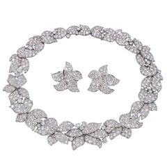 Collection of Helene Arpels Superb Diamond Platinum Flower Necklace and Ear Clip