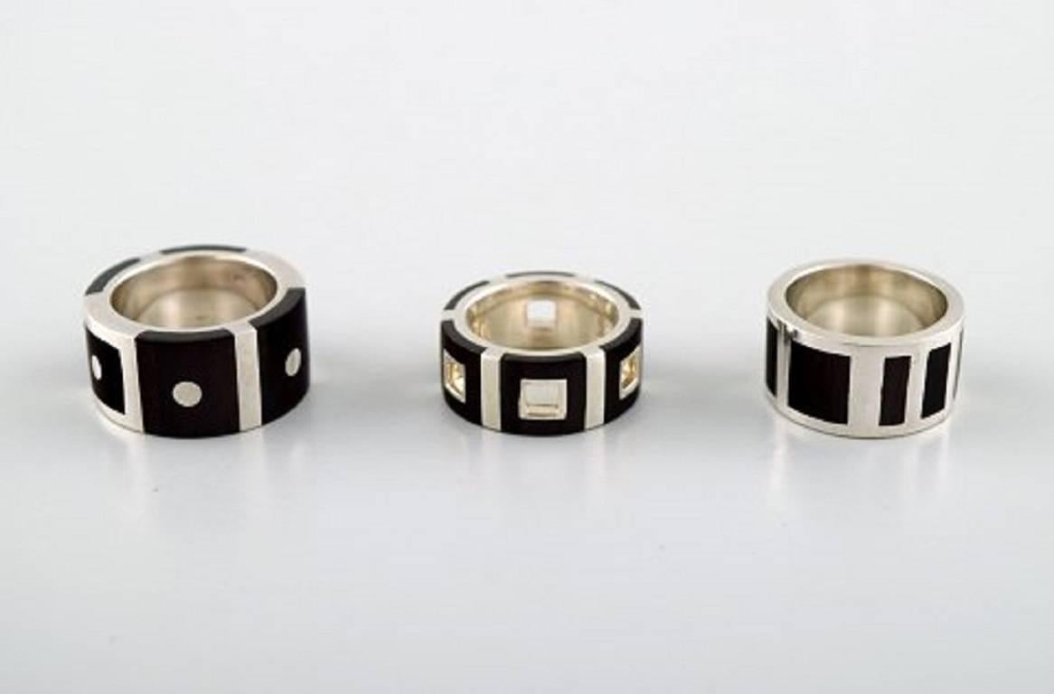 Modern Collection of Jewelry in Sterling Silver, Five Rings and a Pendant For Sale