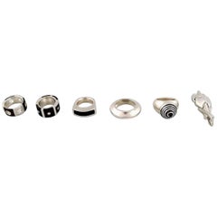 Collection of Jewelry in Sterling Silver, Five Rings and a Pendant