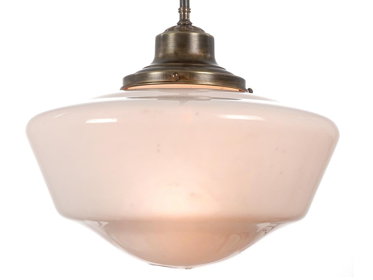This large 16 inch diameter School House fixture is the quintessential industrial lamp. They were mostly found in schools, commercial buildings and restaurants from the 20s to 1950s. This fixture gave off a nice even light and blended with all
