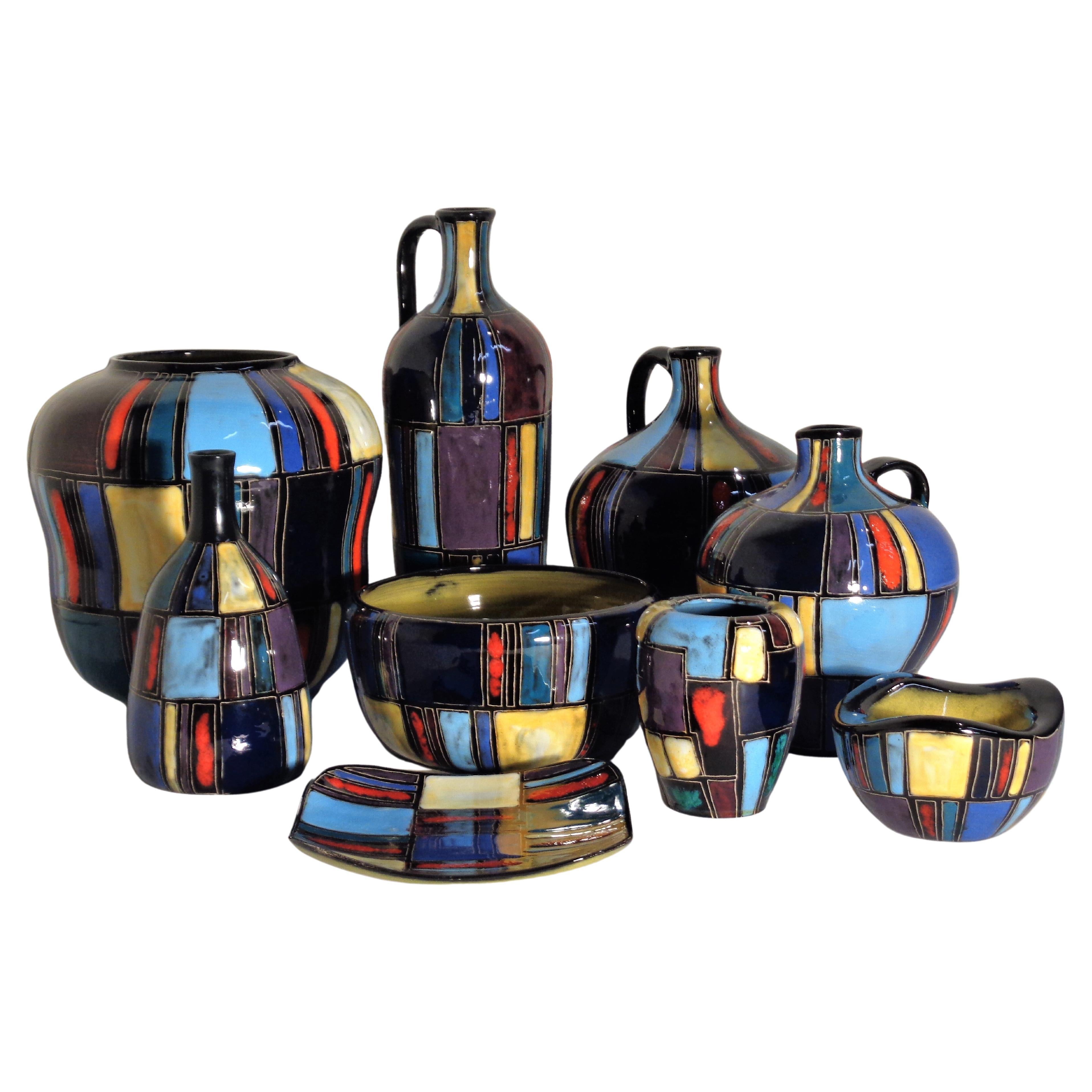 A collection of nine assorted hand built pottery pieces - vases, bowls, charger, more...
 w/ brilliant multi-color hand glazed abstract geometric designs by Lu Klopfer, Germany 1950's. Ludwig ( Lu ) Klopfer ( 1924 -1977 ) was the grandson of Johann