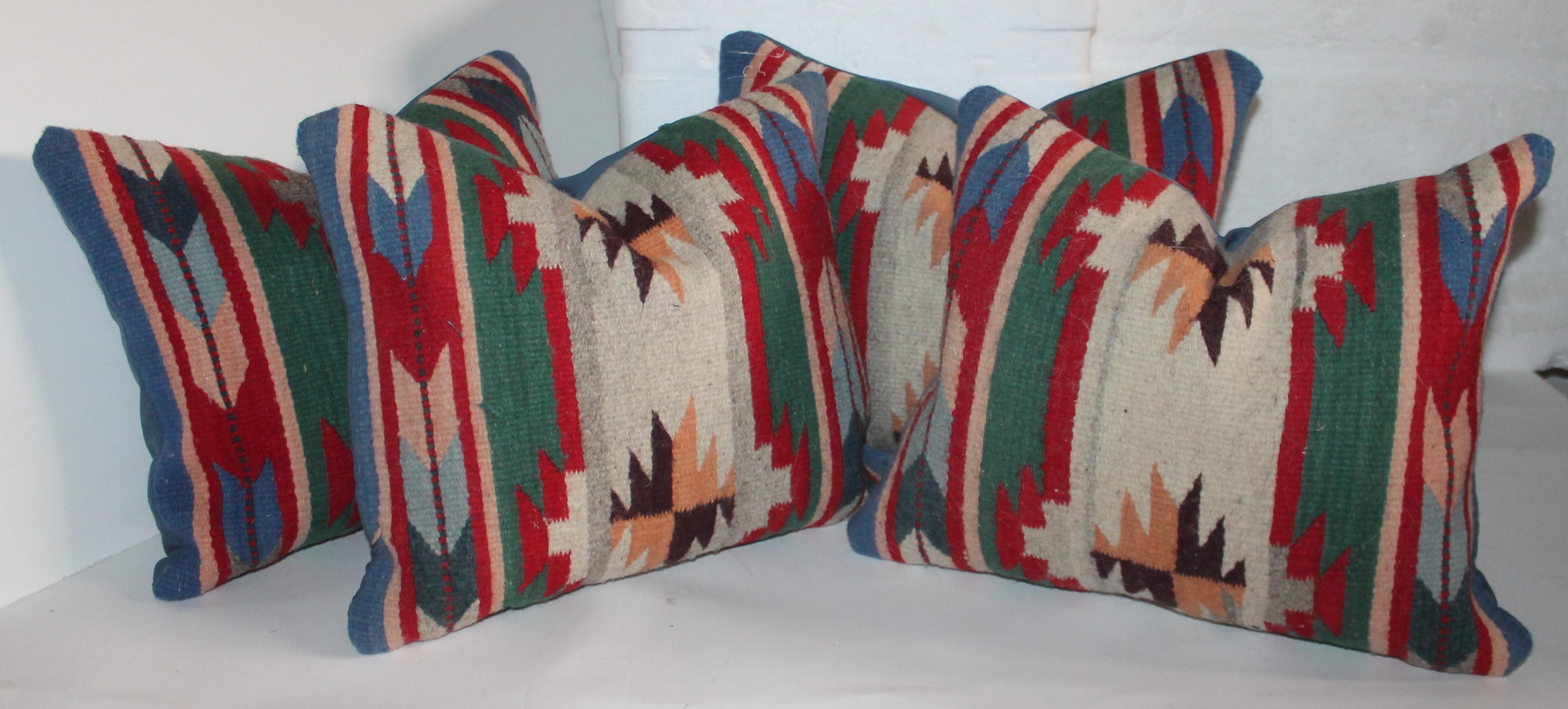 Collection of Mexican Indian weaving pillows that have a Navajo look to them. Selling as a group of four pillows.