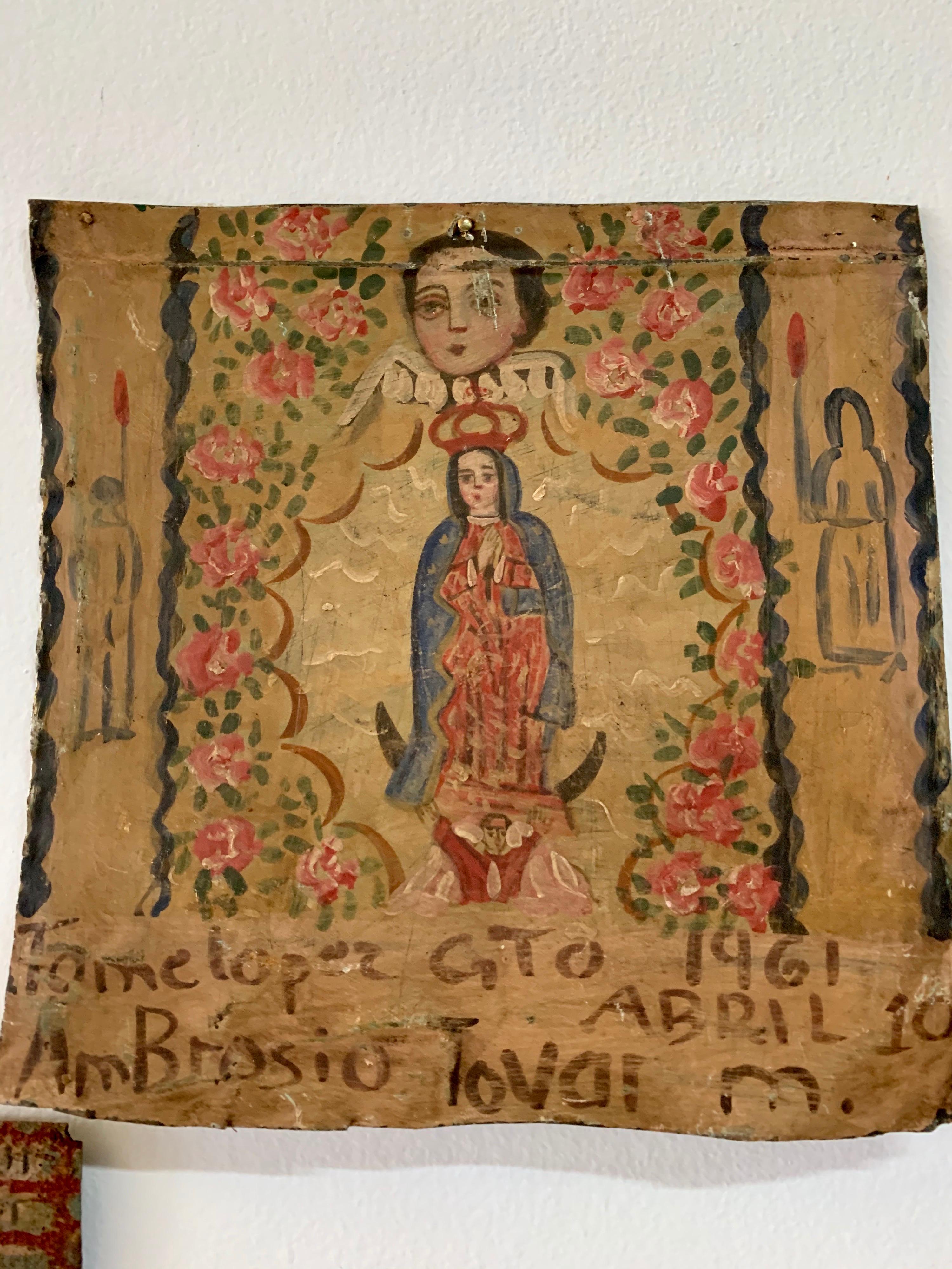This is an amazing and important collection of 8 plaques (7 tin metal and one in wood) that have been hand painted by Catholic religious devotees in gratitude to either Christ, Virgin Mary or a specific Saint. These are Mexican and painted in 1950s