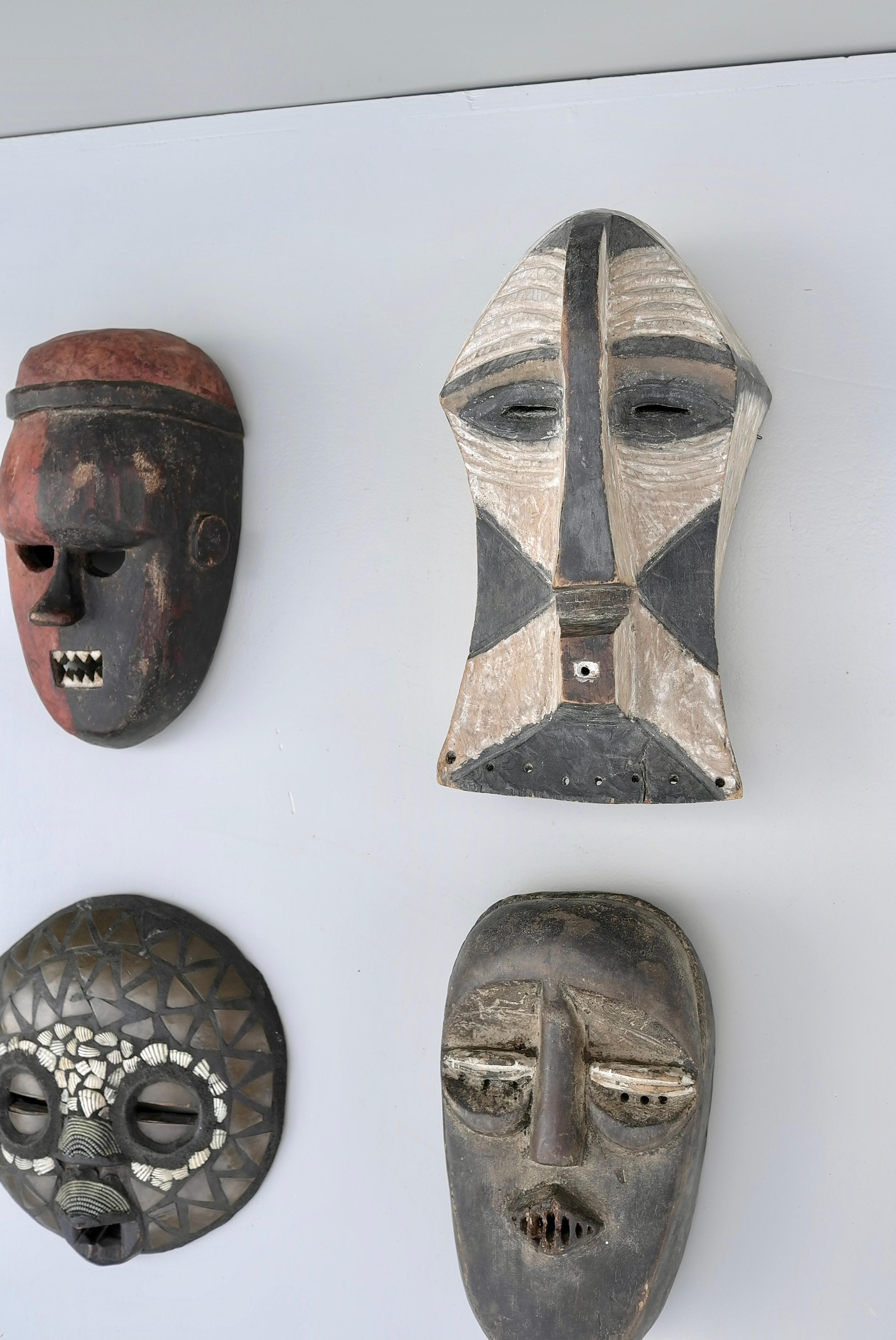 Collection of Mid-Century African Multicolored Wooden Masks In Good Condition For Sale In Den Haag, NL