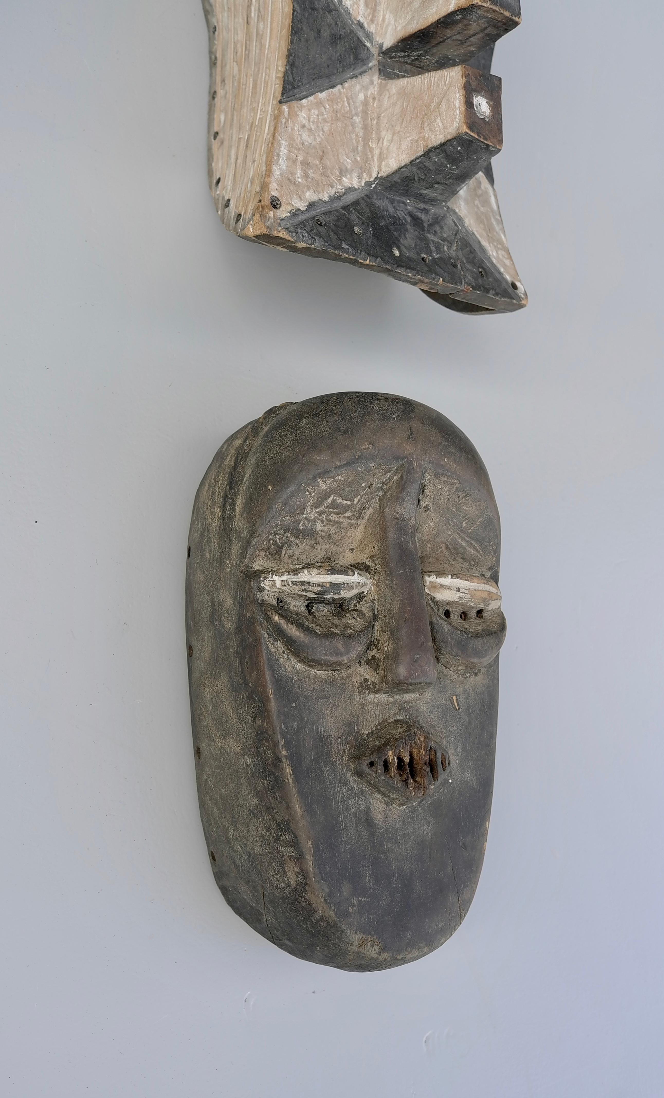 Collection of Mid-Century African Multicolored Wooden Masks For Sale 1