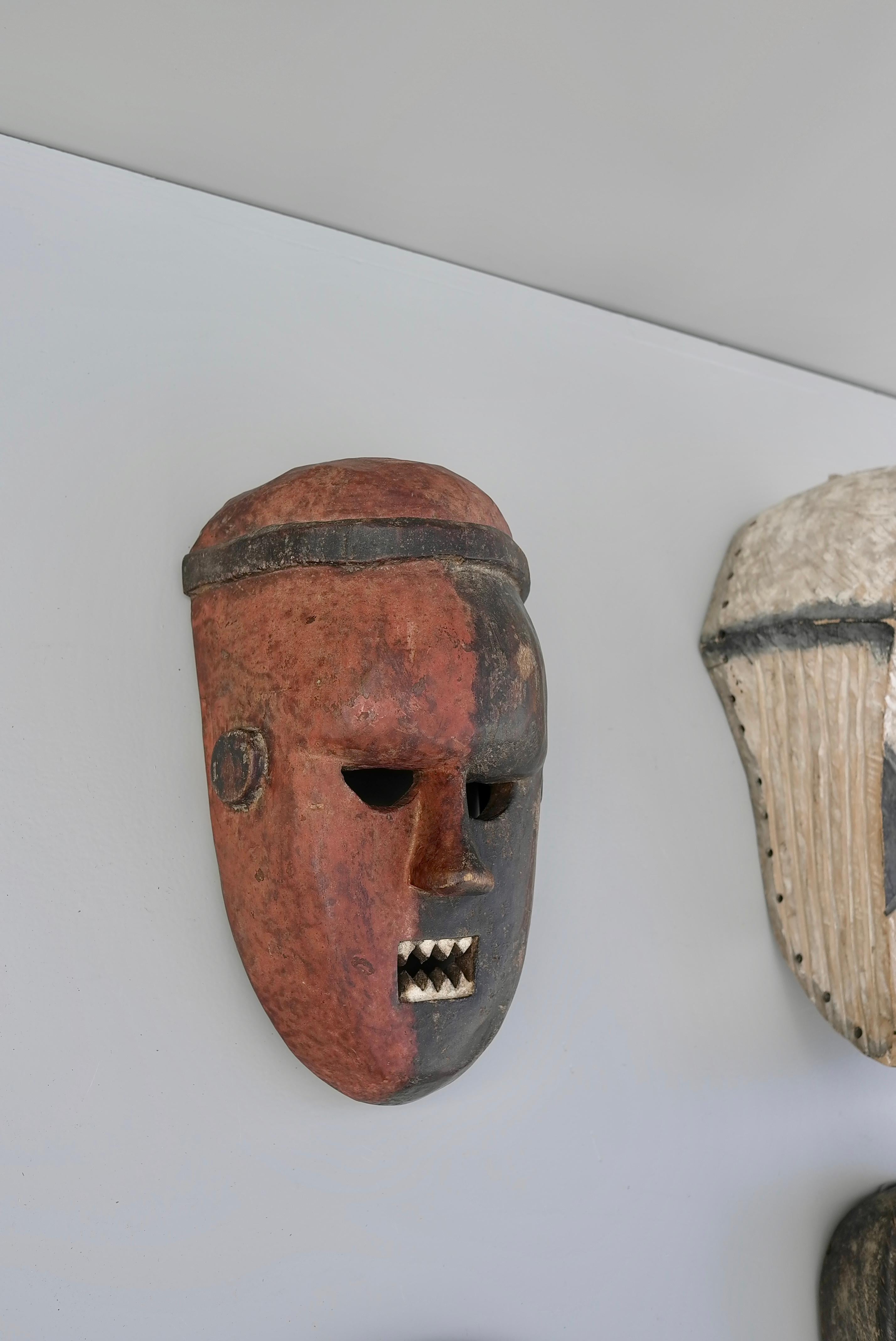 Collection of Mid-Century African Multicolored Wooden Masks For Sale 2