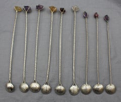 Colección de nueve cucharas o machacadores para té helado, de plata y cristal de cuarzo, de Brasil