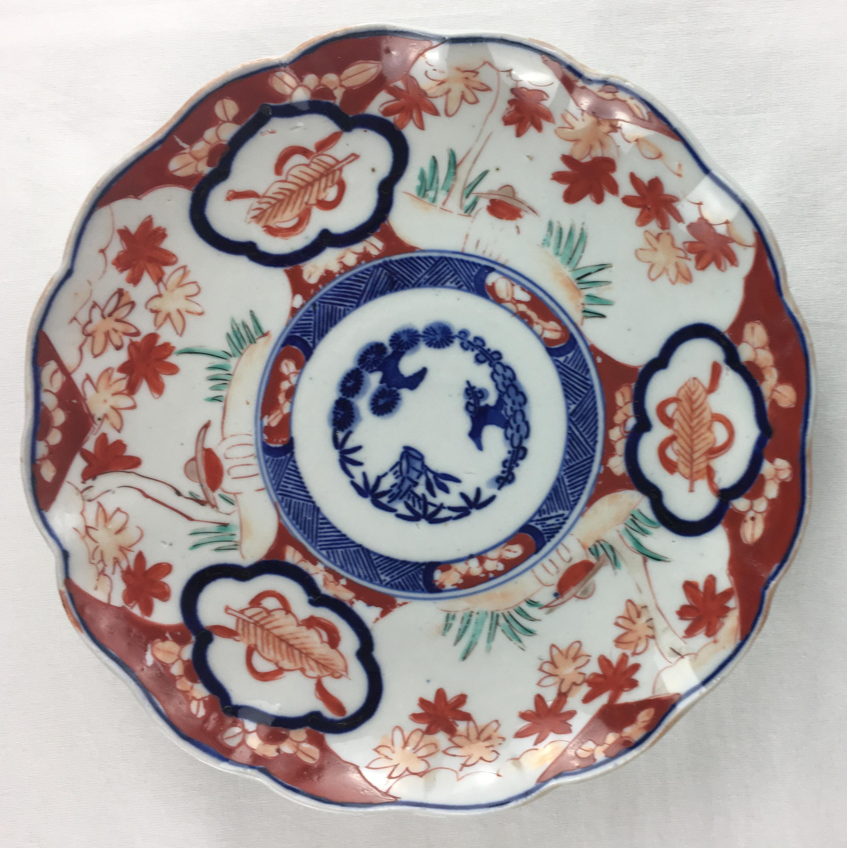 Hand-Painted Collection of Nine Japanese Imari Chargers