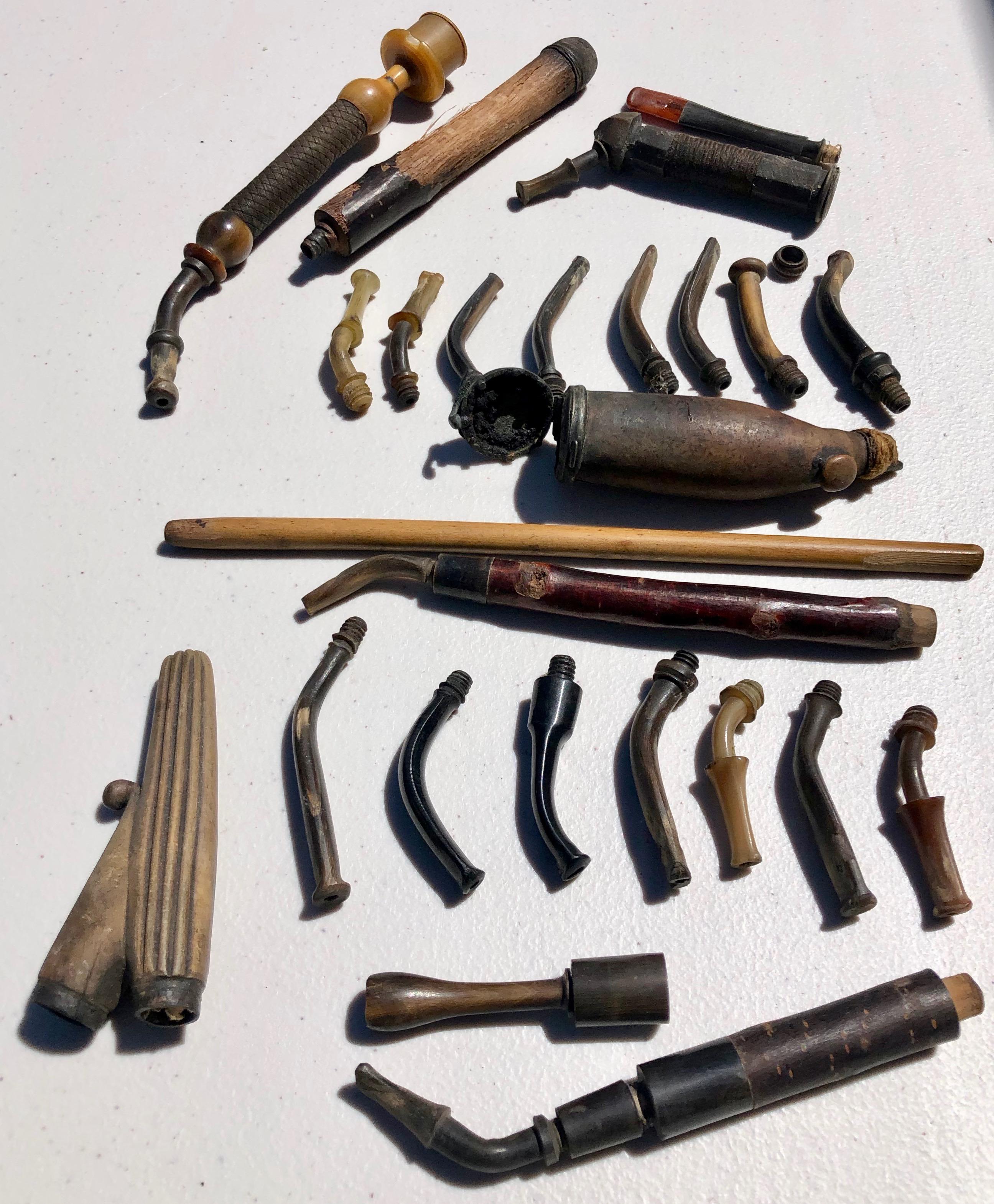 This is a collection of a variety of old pipe pieces all listed below. Framed together as a collection or used to replace needed pipe parts this is a fun collection.

Measures: 17 small mouth pieces 2-3