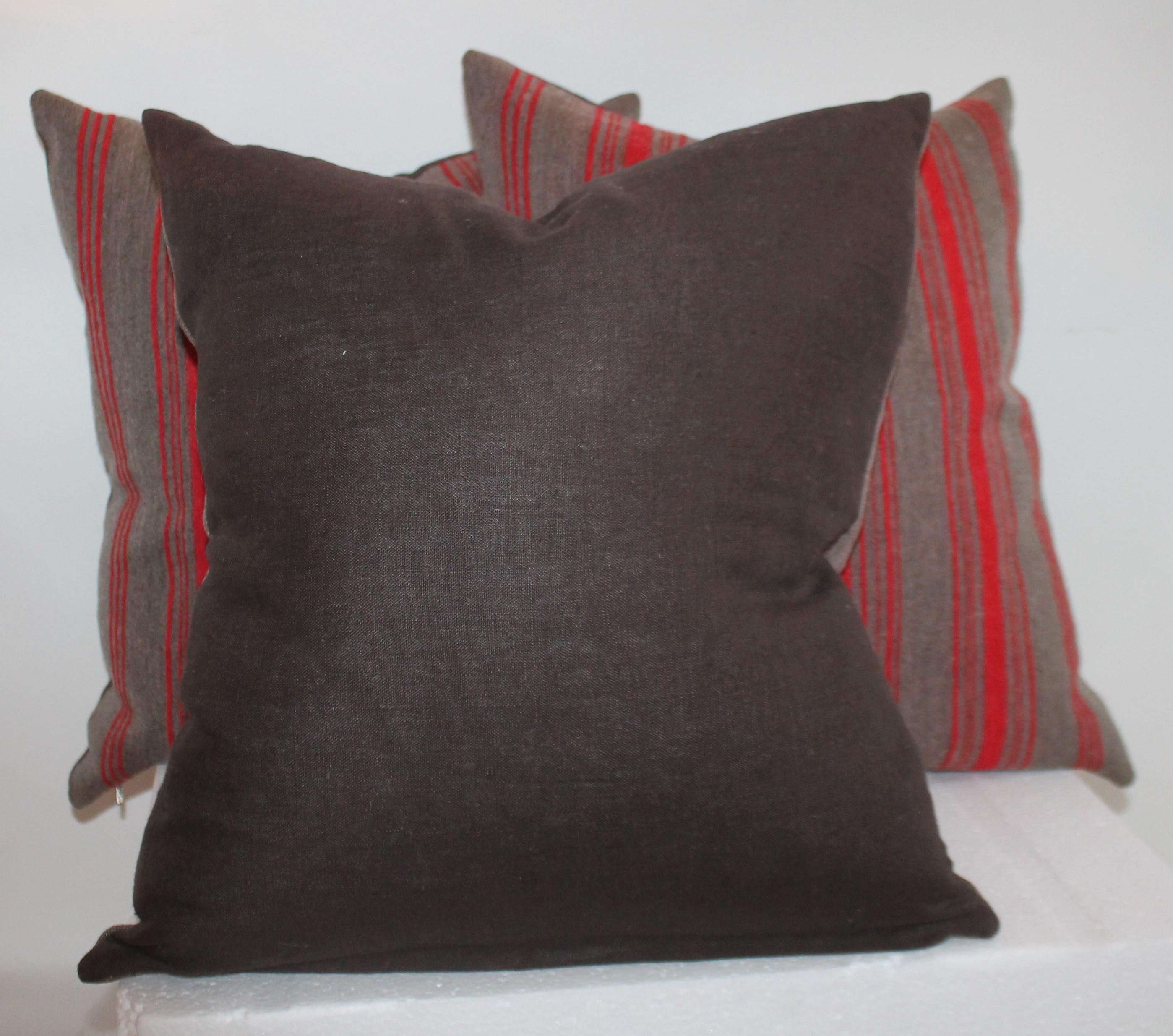 Hand-Crafted  Collection of Red and Grey 19th Century Ticking Pillows For Sale