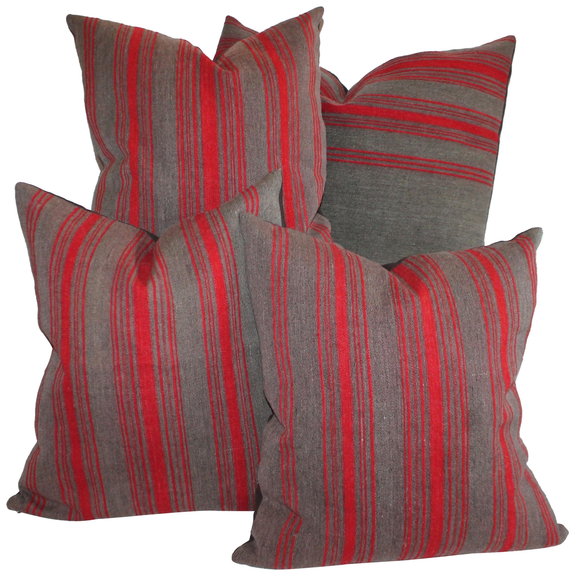  Collection of Red and Grey 19th Century Ticking Pillows