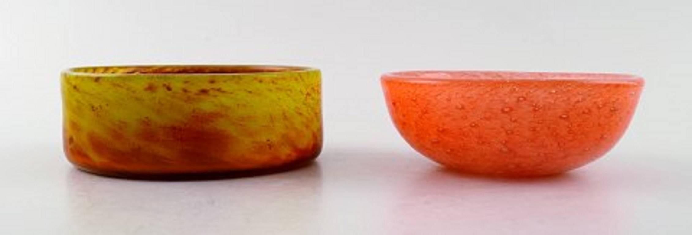 orange bowls and vases